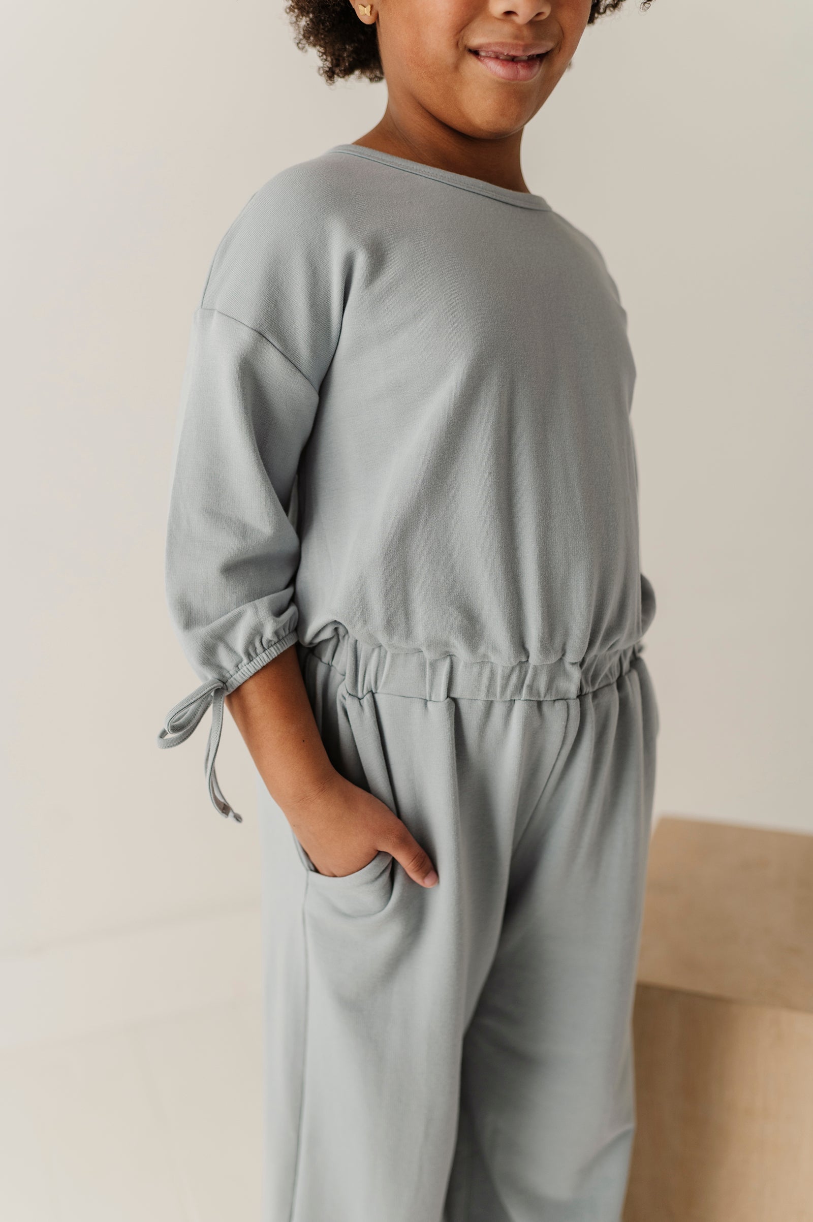 Girls Drop Shoulder Blouson Knit Jumpsuit In Rose Cloud