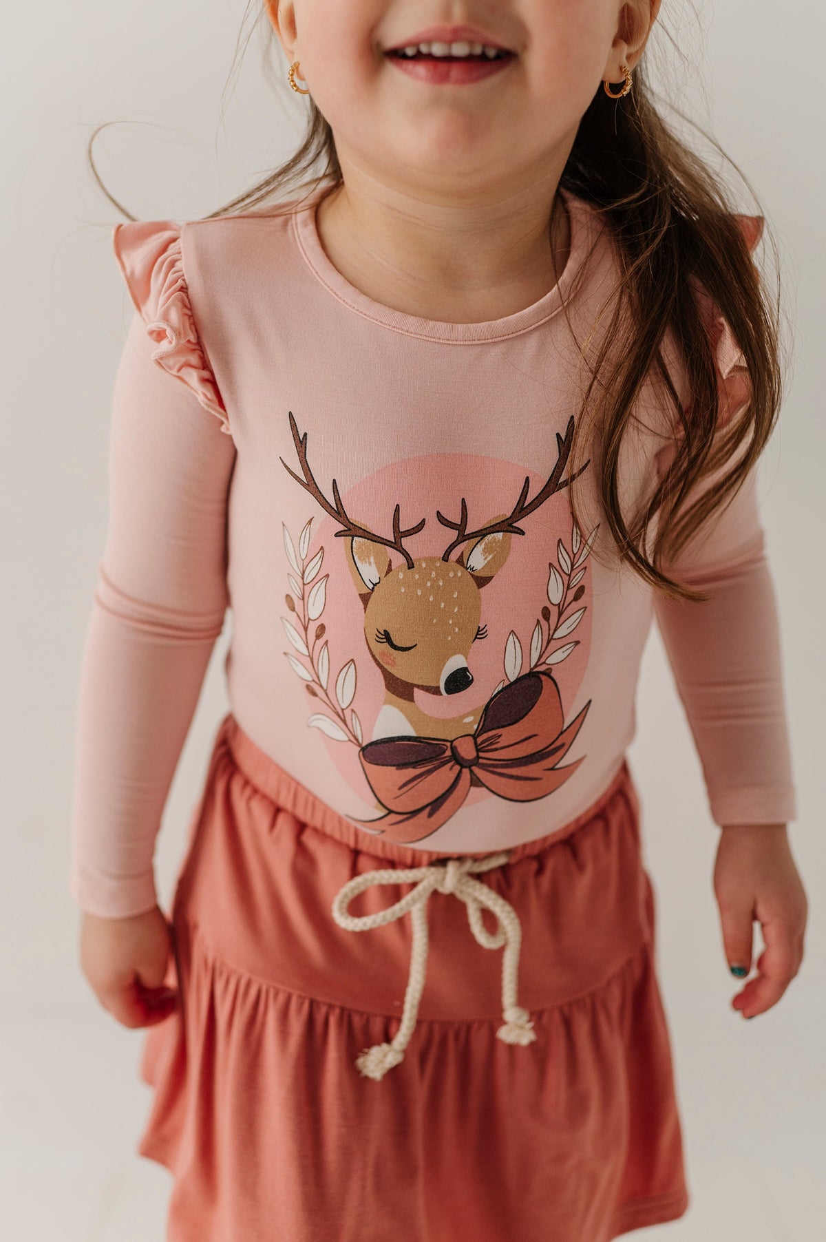 Girls Long Sleeve Ruffle Top In Reindeer On Holiday Blush