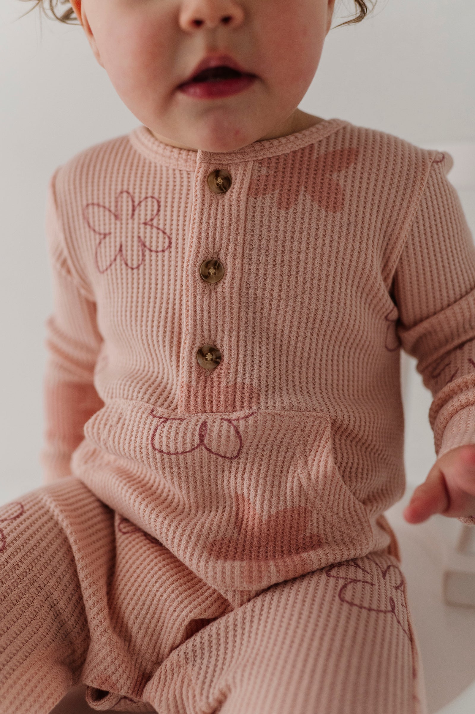 Girls Waffle Romper In Daisy Doodle