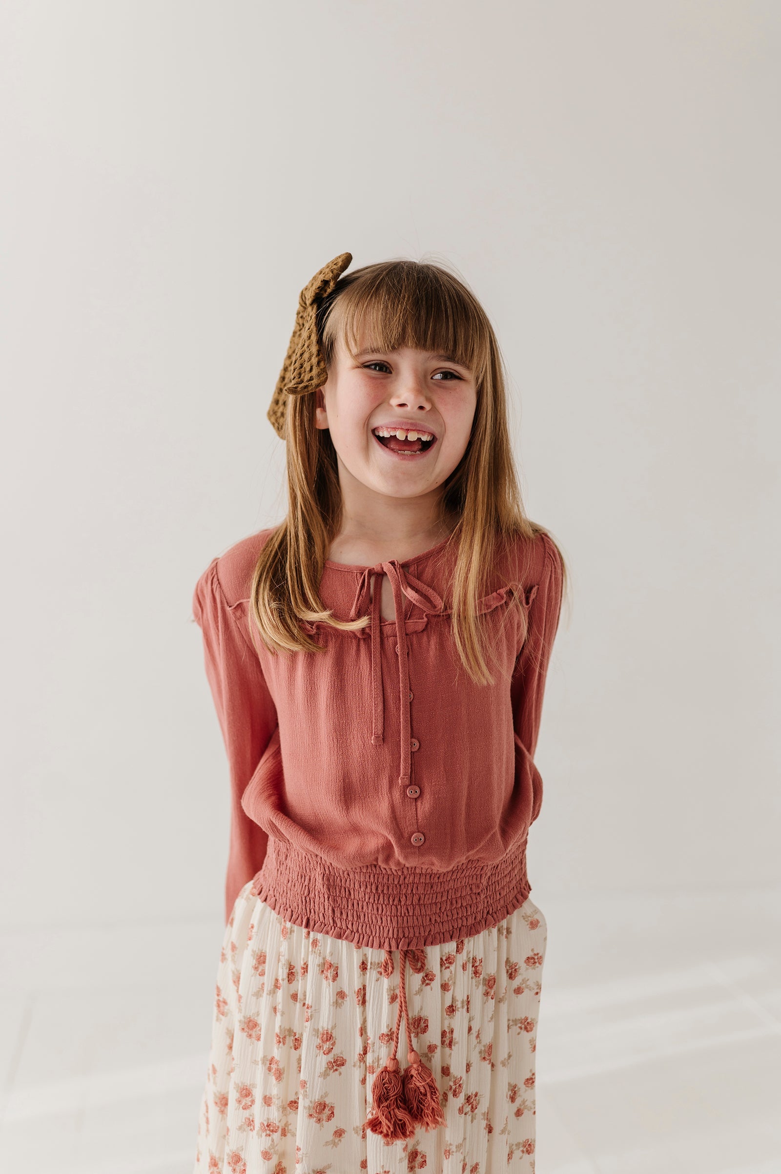 Girls Peasant Blouson Long Sleeve Top In Brick Dust