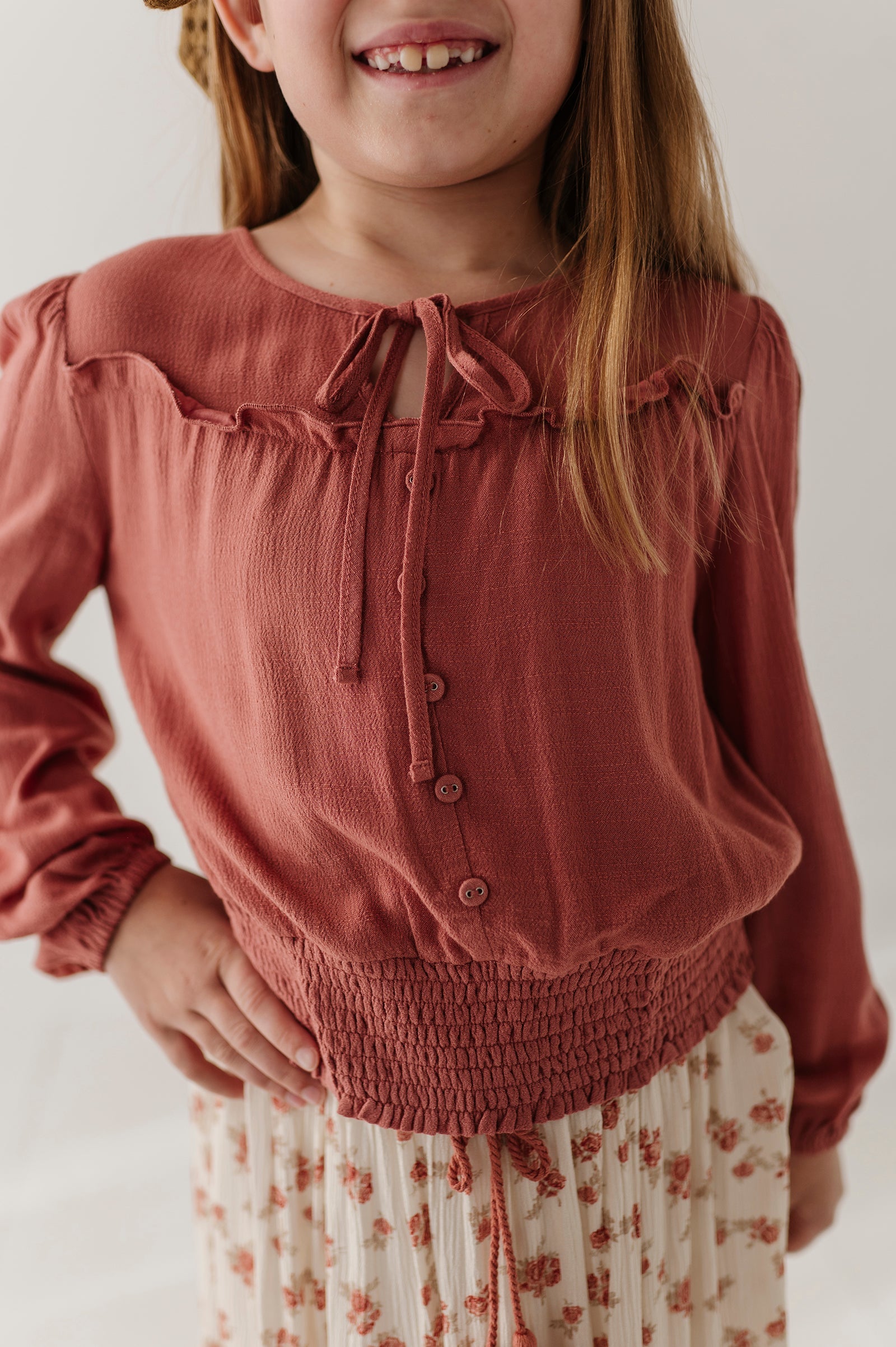 Girls Peasant Blouson Long Sleeve Top In Brick Dust
