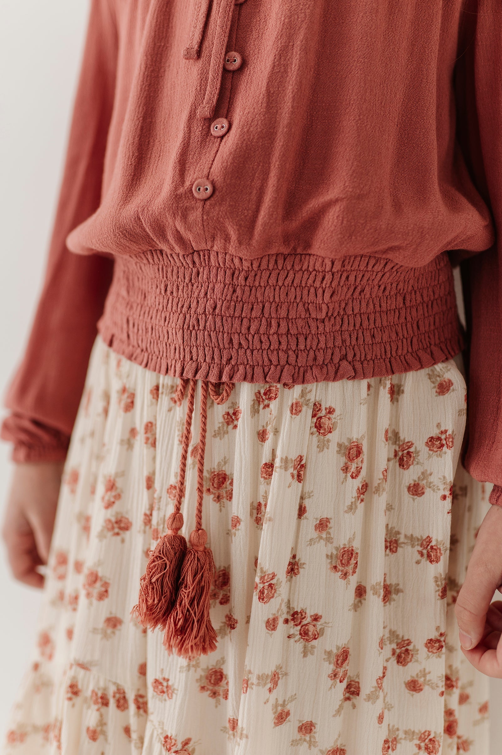 Girls Peasant Blouson Long Sleeve Top In Brick Dust