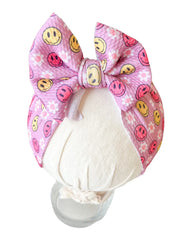 Smiles On Pink Headwrap Bow