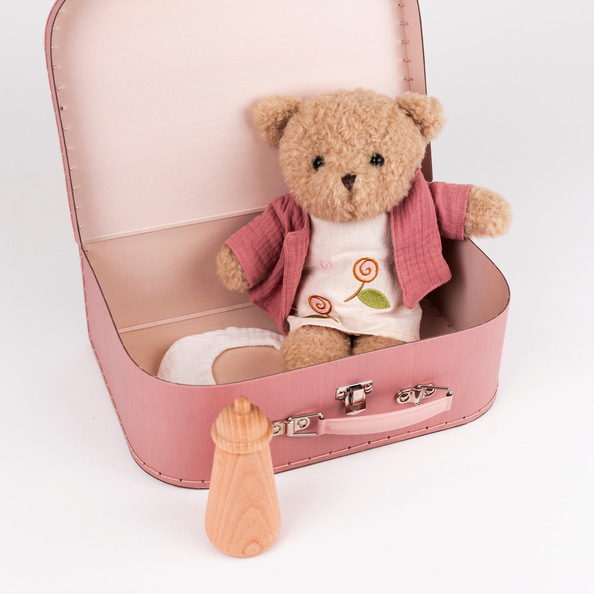Morrissette With Clothes In A Case