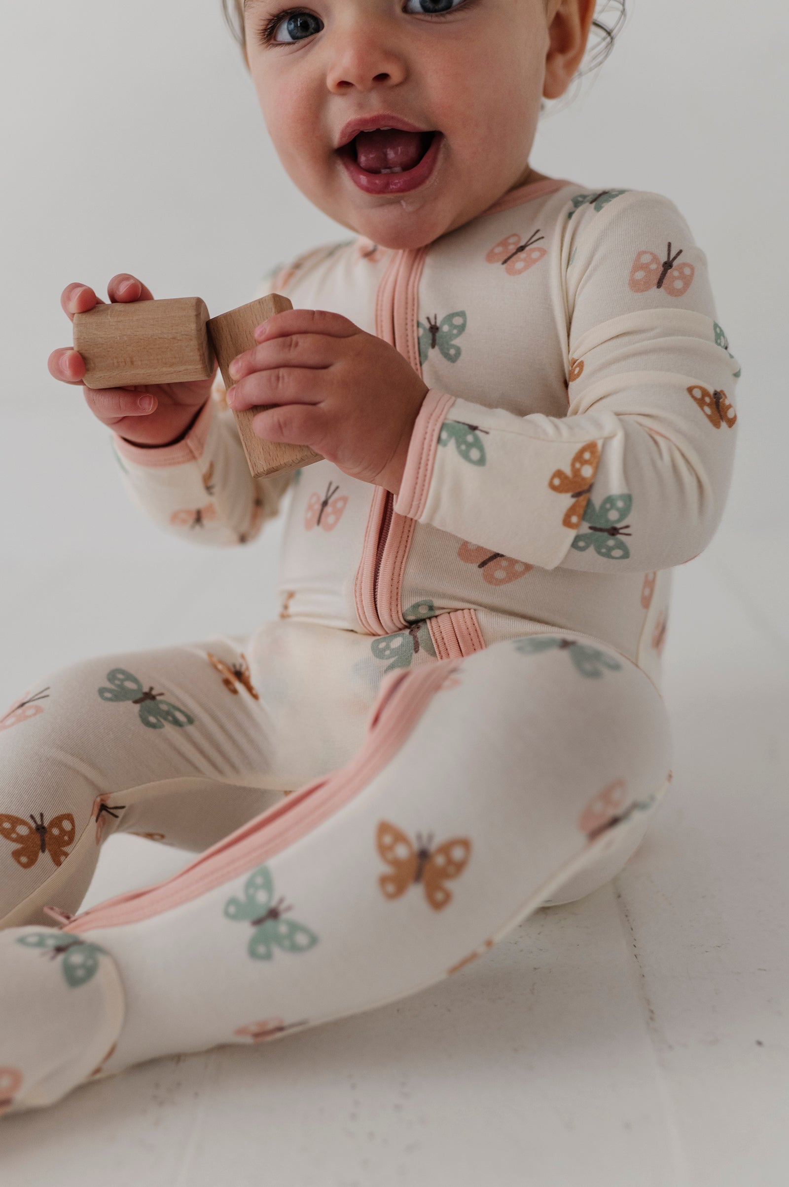 Baby Girl Footie Romper In Pastel Butterflies