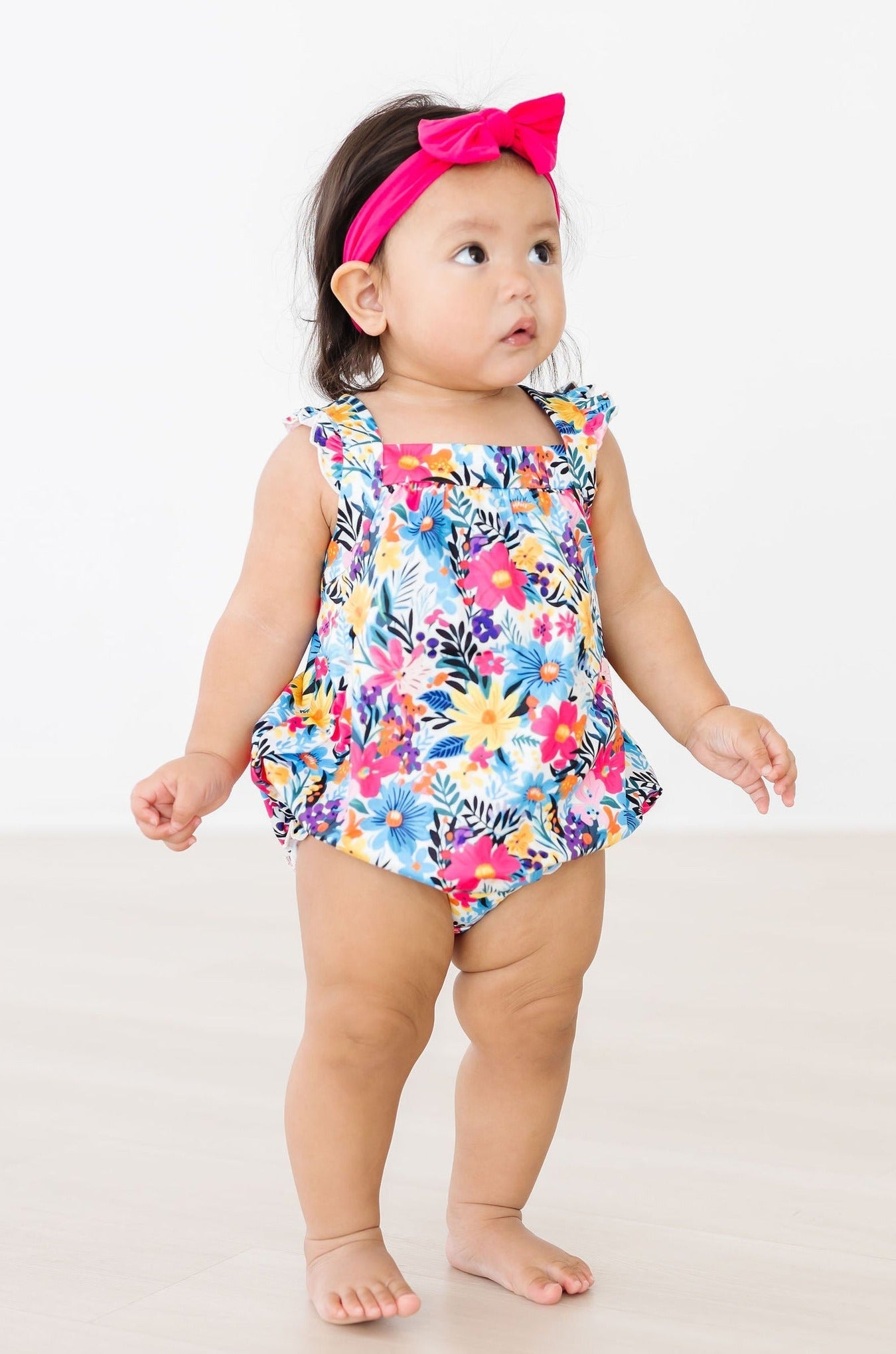 Petal Paradise Ruffle Cross Back Romper