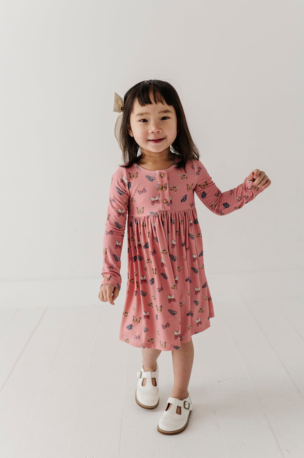 Girls Long Sleeve Henley Dress In Butterfly Bloom