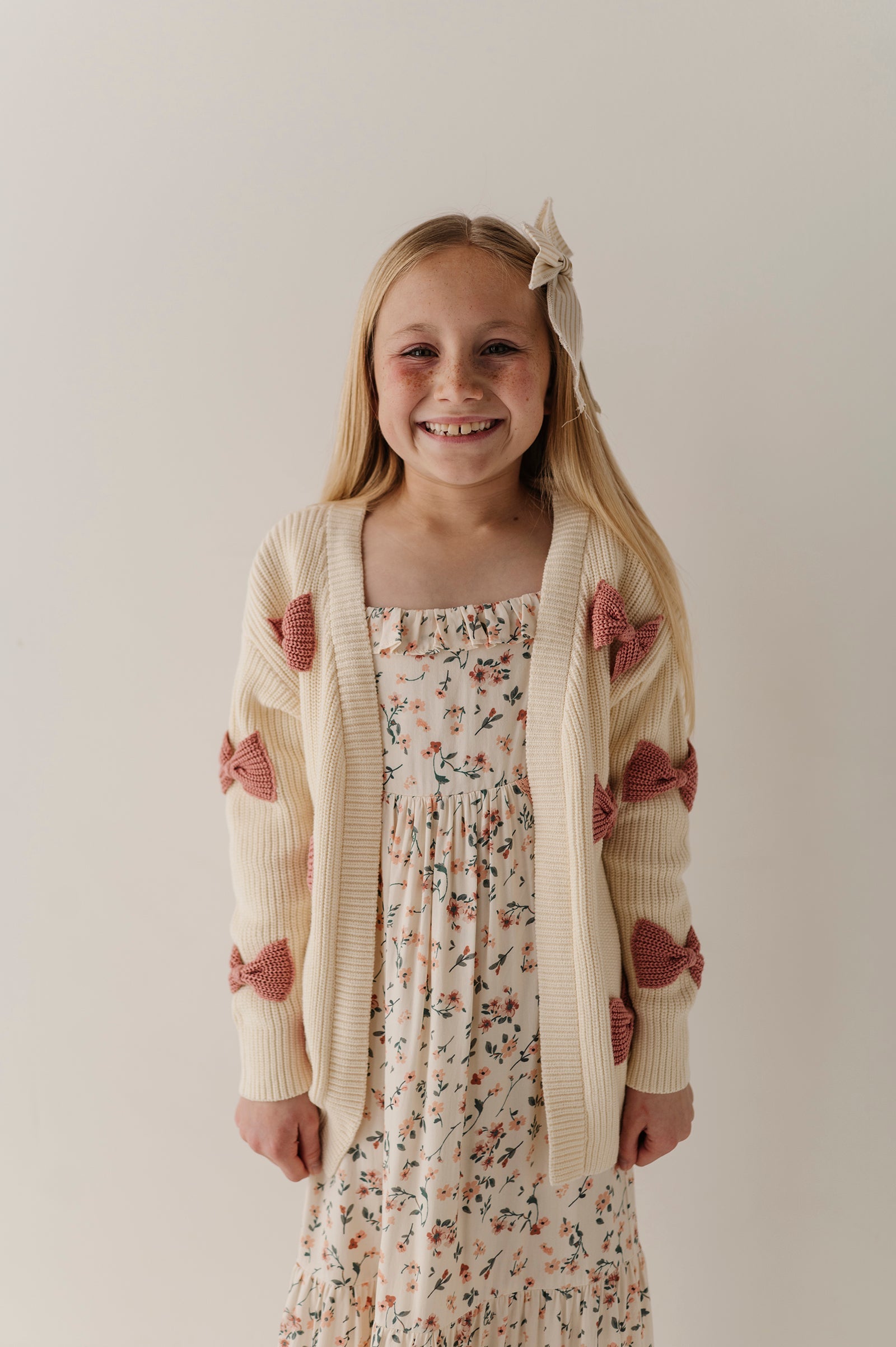 Girls Bow Cardigan In Wild Rosewood