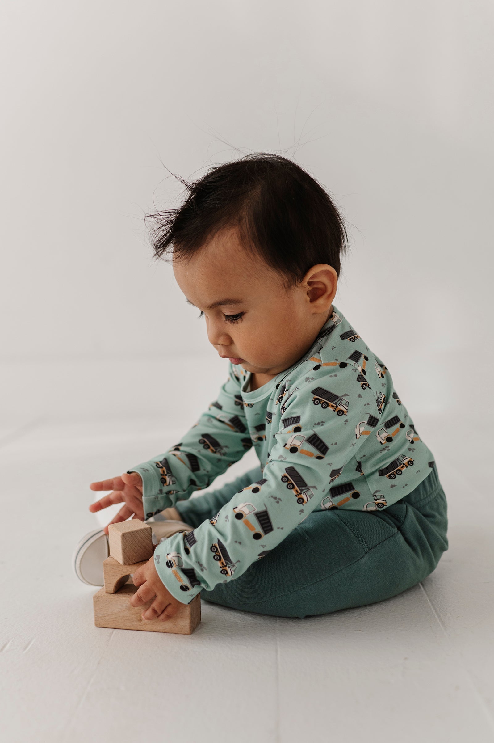Baby Boy Long Sleeve Bodysuit In Dump Trucks