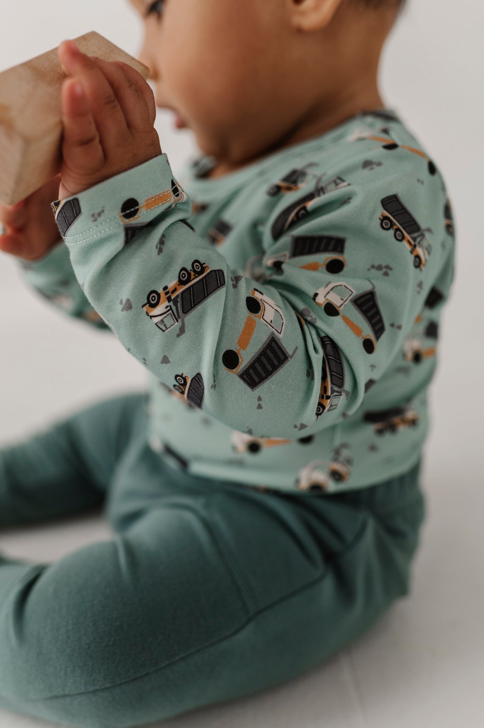 Baby Boy Long Sleeve Bodysuit In Dump Trucks