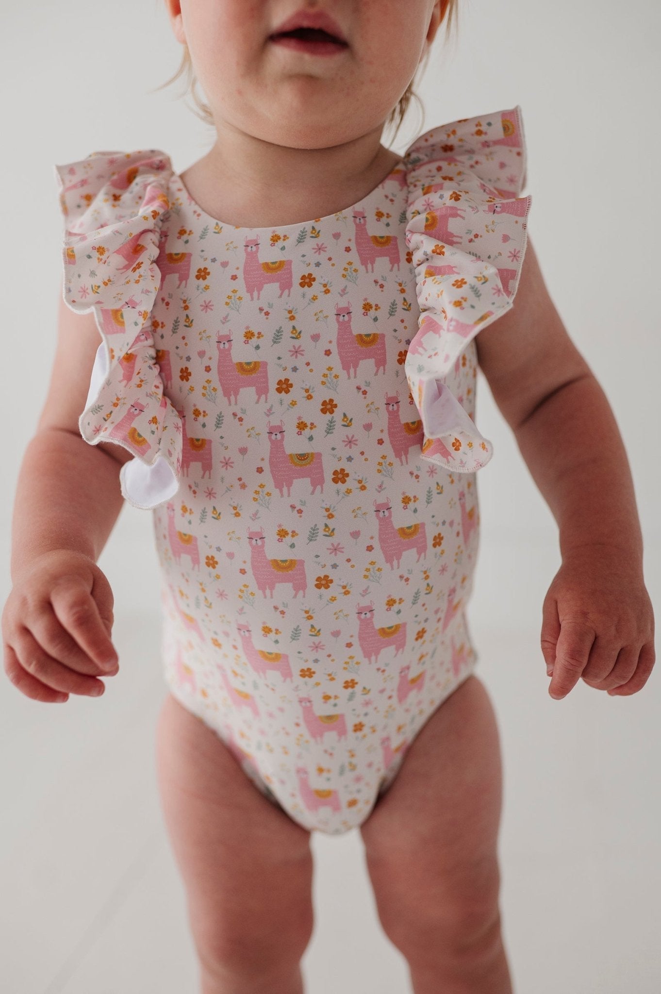 Baby Girl Ruffle Sleeve Cross Back Swimsuit In Llamas