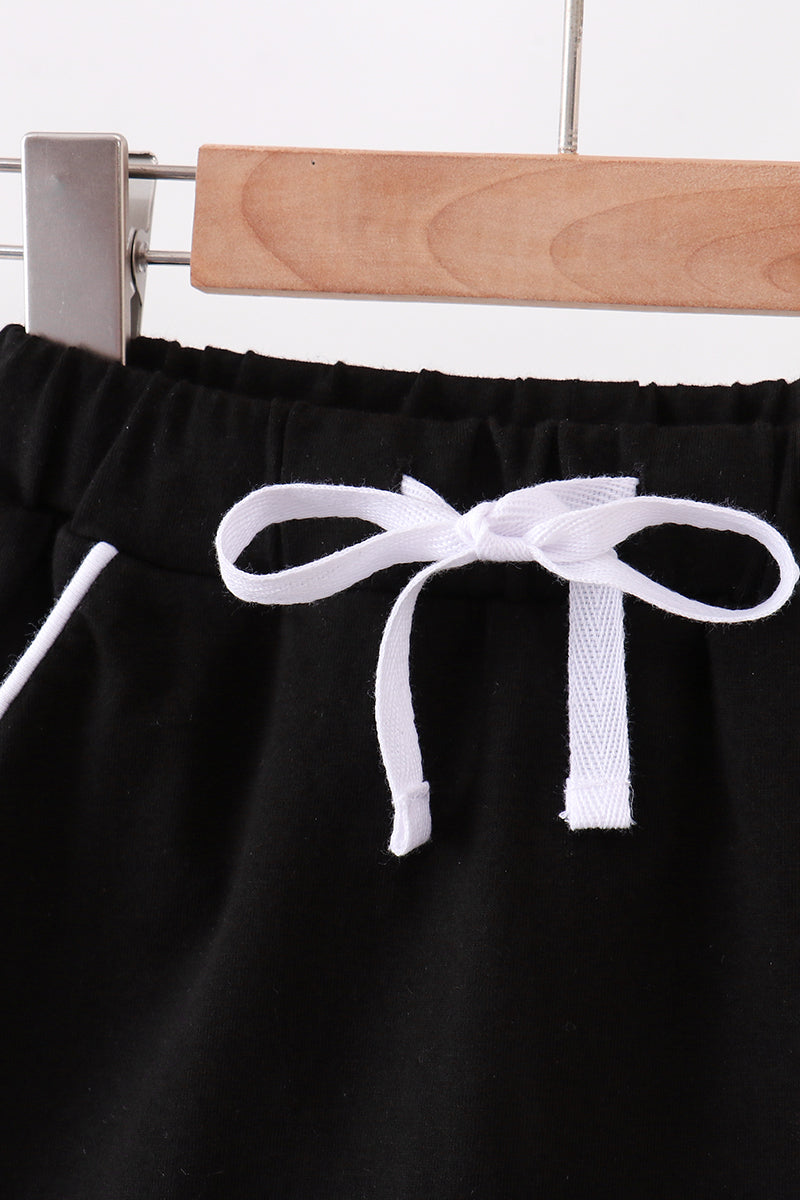 Black Scallop Hem Bow Skort