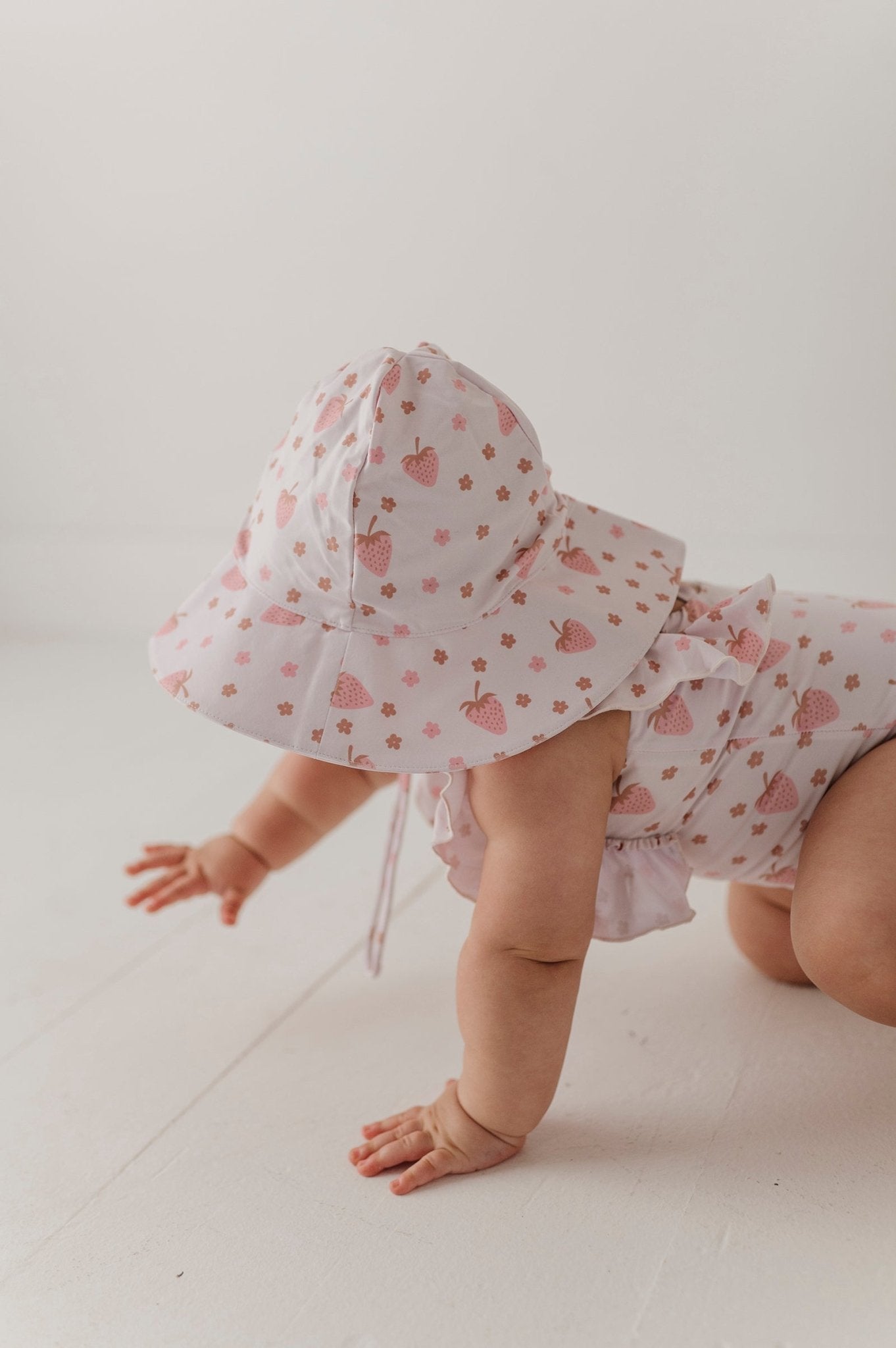 Baby Girl Ruffle Sleeve Cross Back Swimsuit In Strawberries
