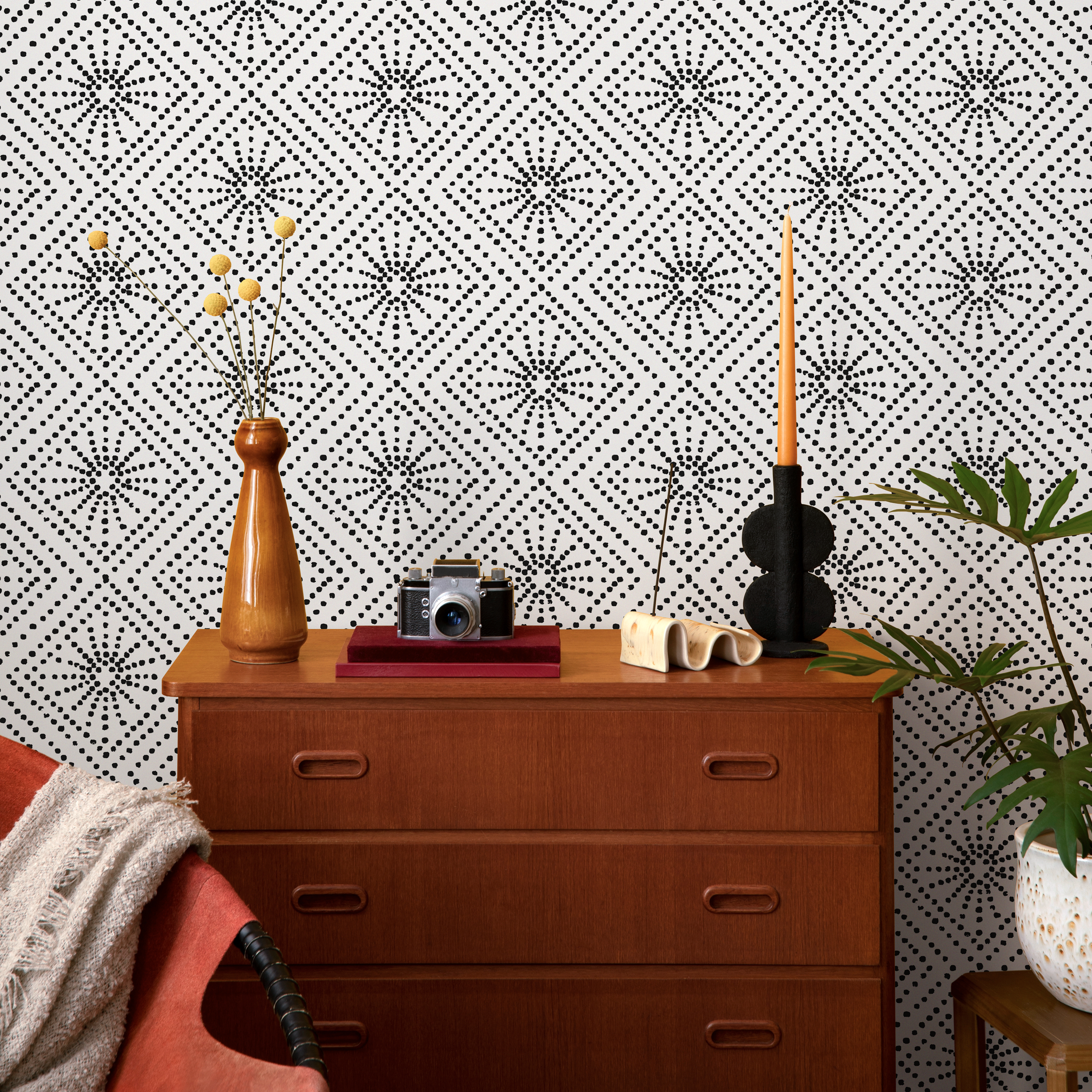 Geometric Wallpaper With A Dotted Starburst Pattern In Black And White - C533