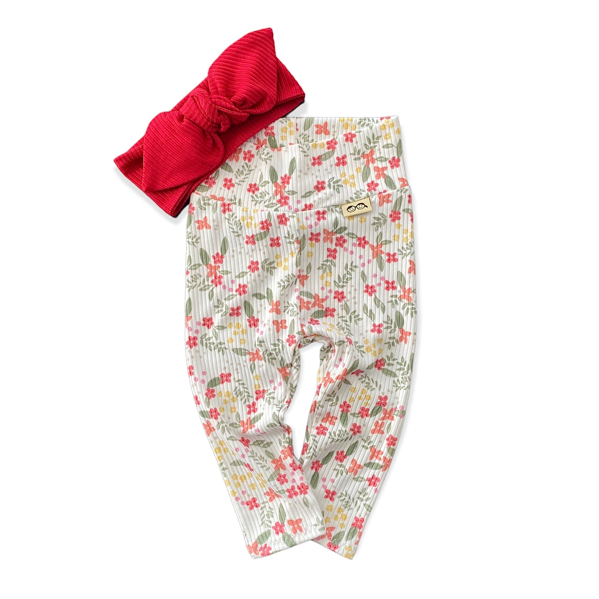 Colorful Dainty Flowers On White Ribbed Leggings With Red Headband