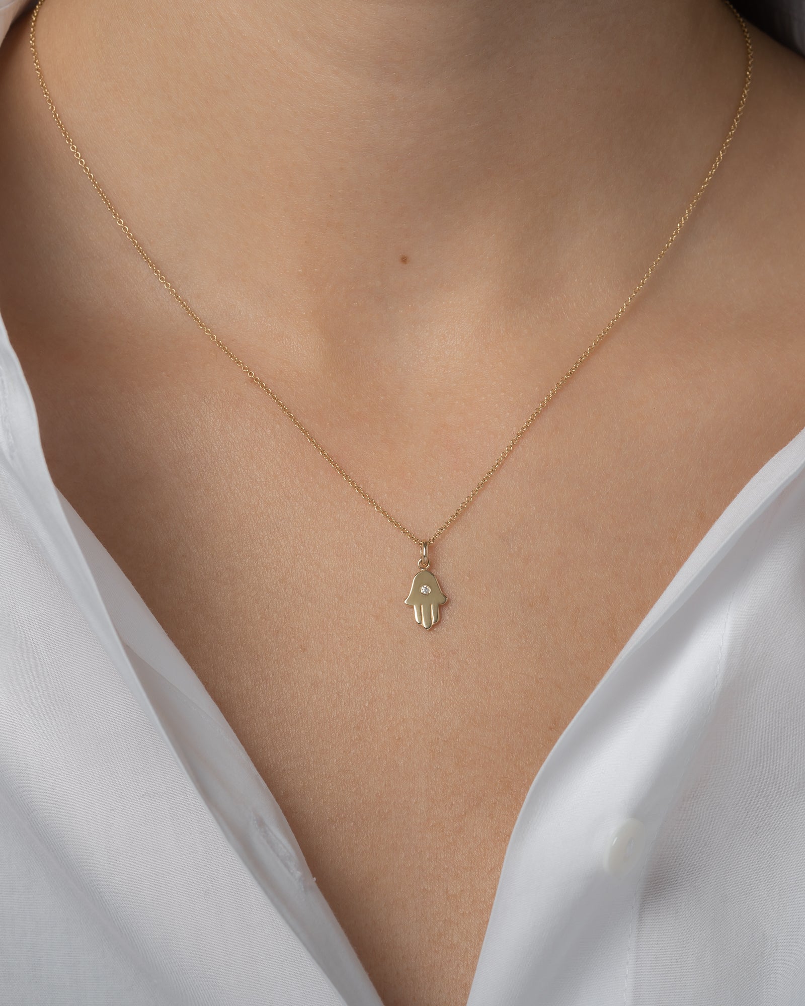 14k Gold Hamsa With Tiny Diamond Pendant