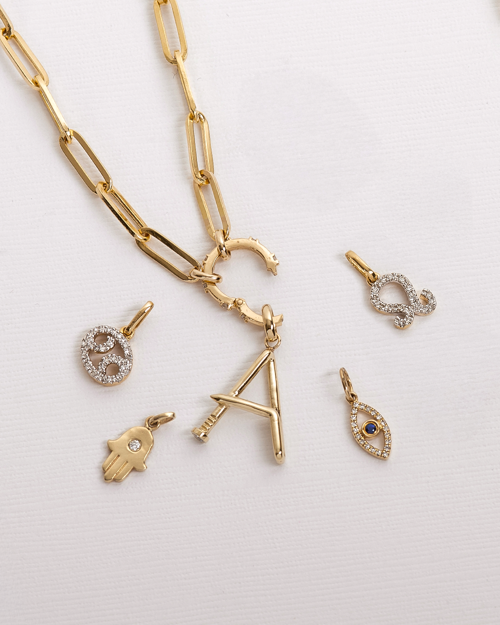 14k Gold Hamsa With Tiny Diamond Pendant