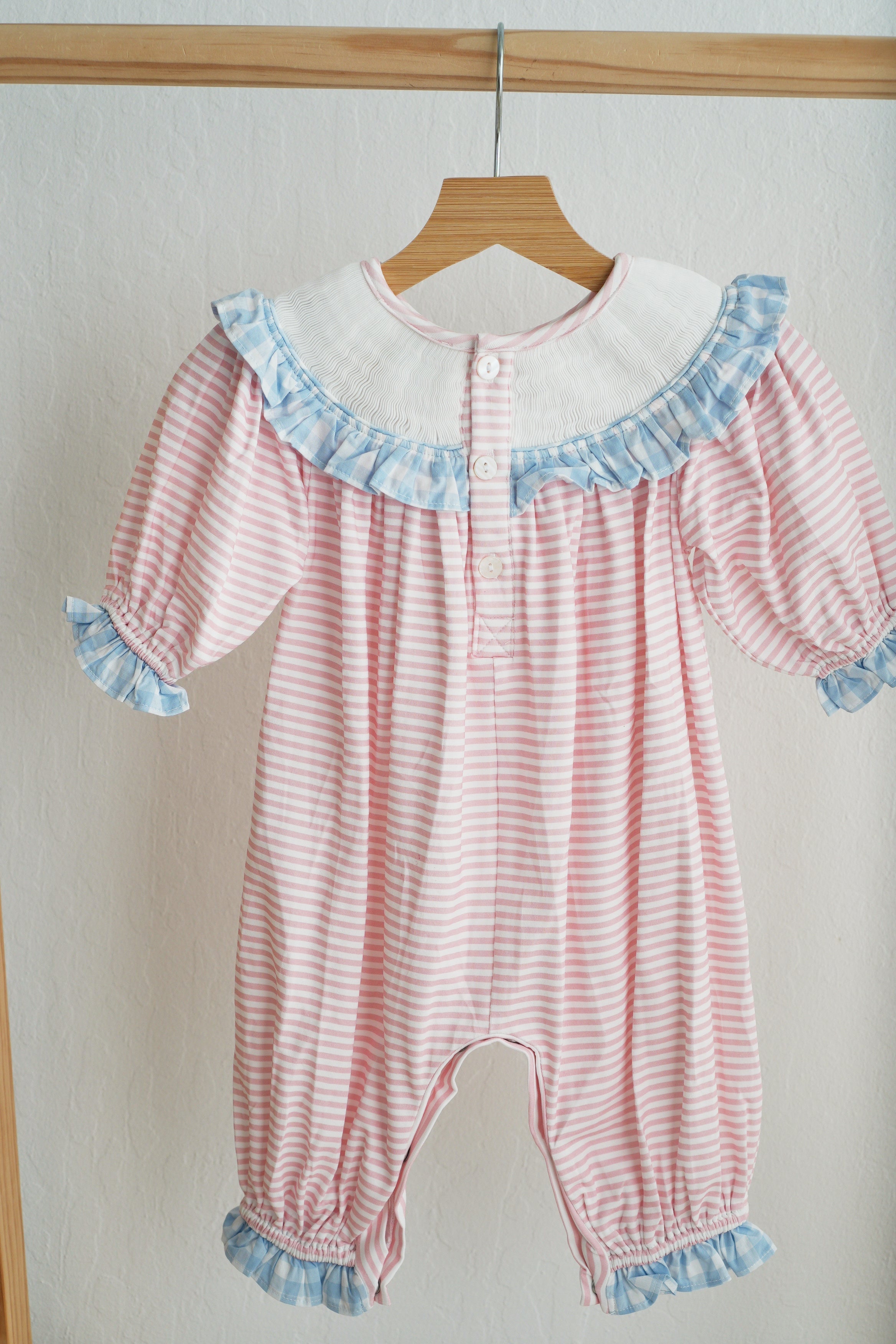 Pink Candy Cane Bow Hand Smocked Ruffle Romper