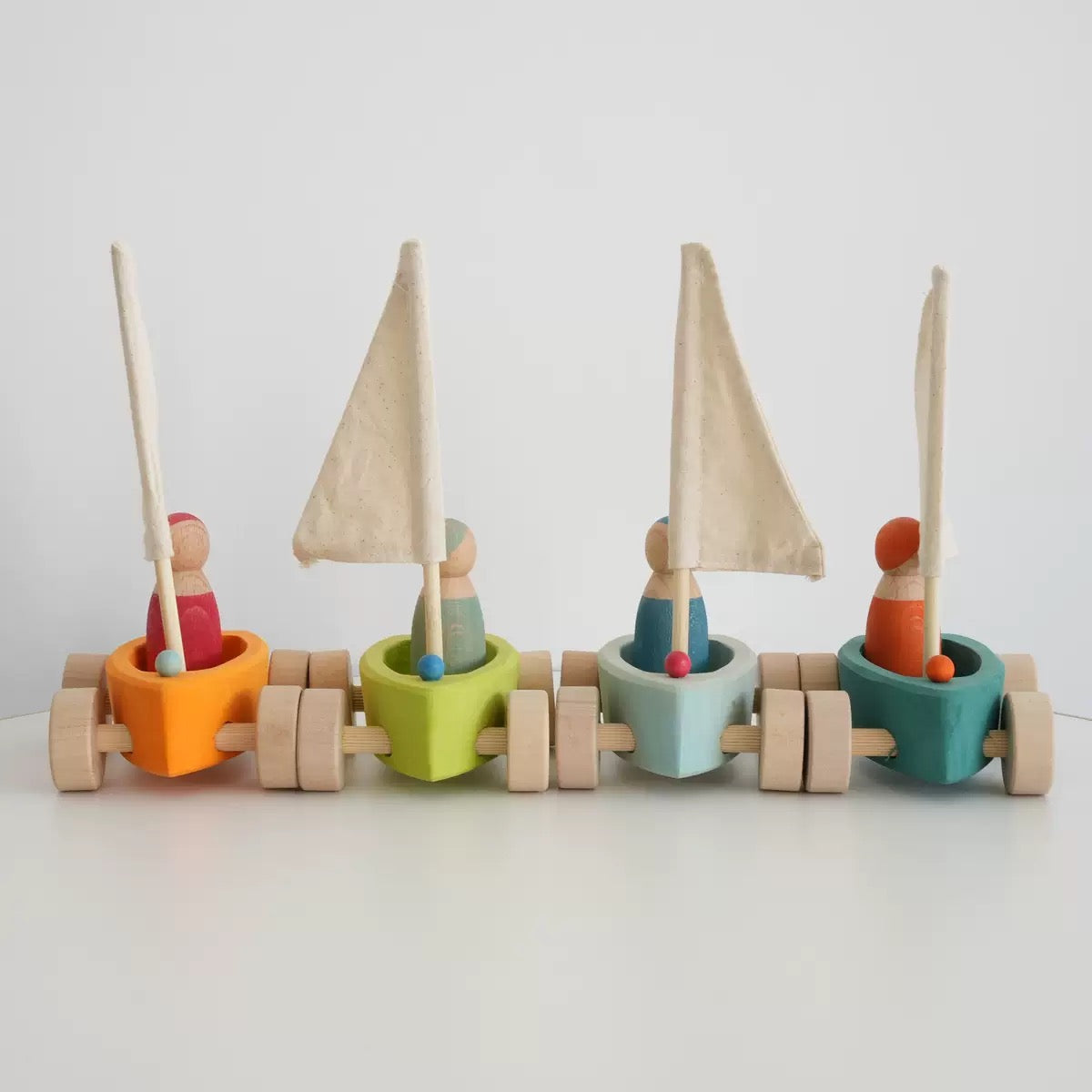 4 Pcs Stained Wooden Land Yachts Set With 4 Pcs Peg Dolls