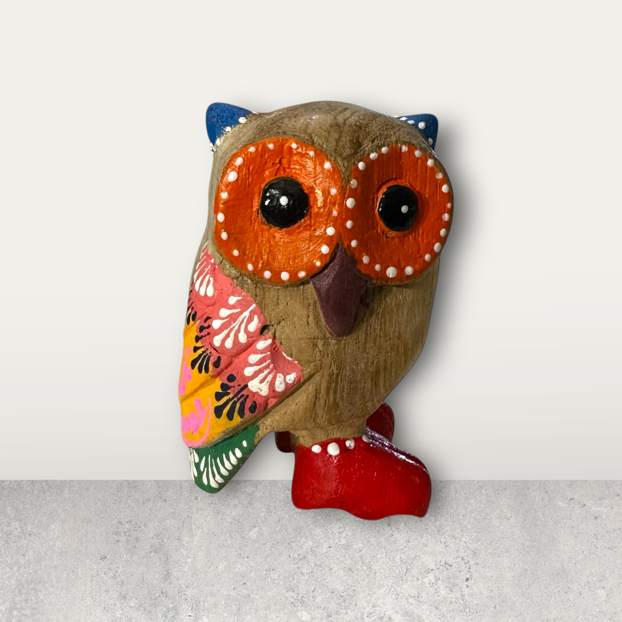 Red-boot Owl With Blue Ears