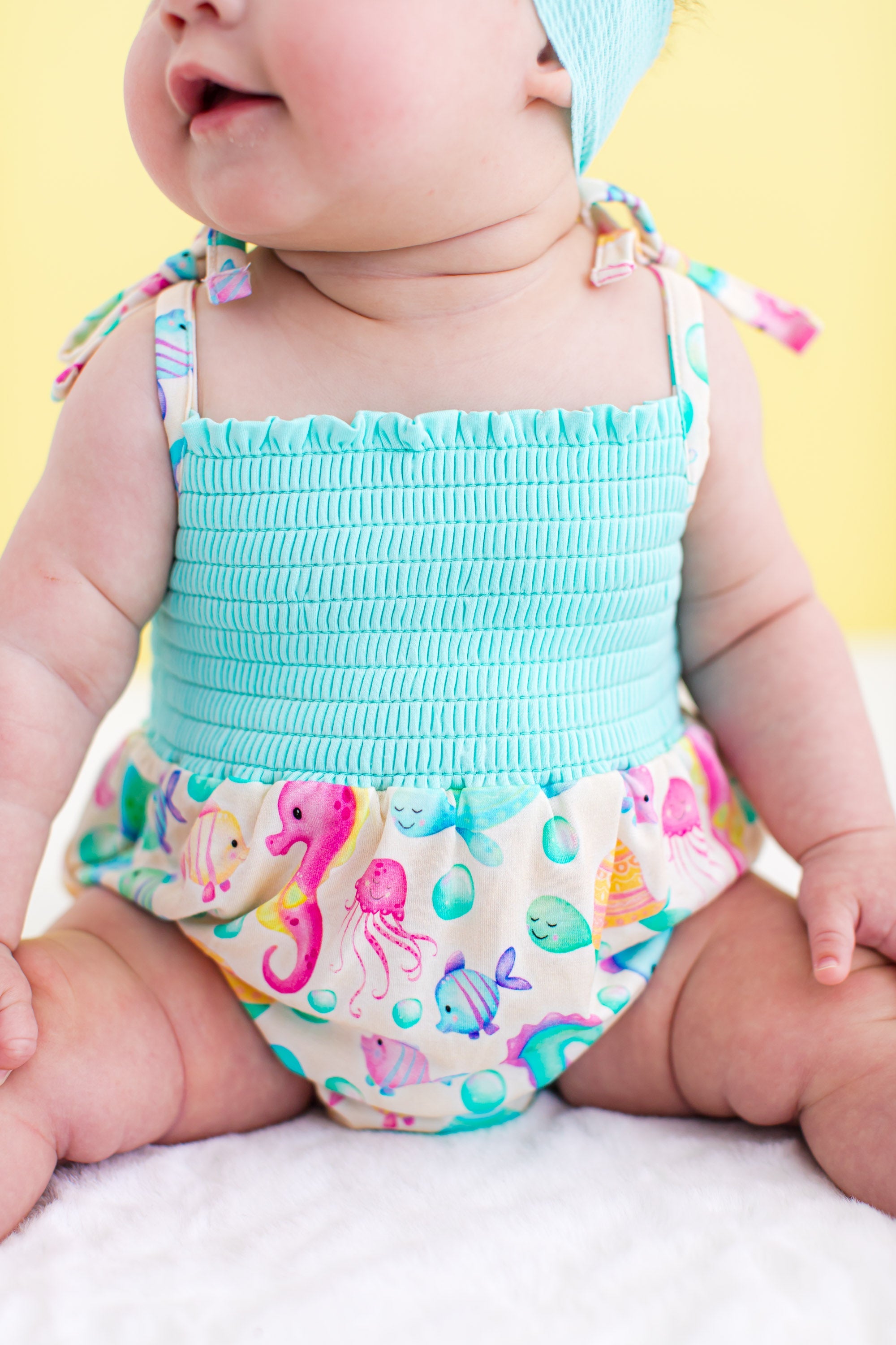 Coral Smocked Birdie Bubble