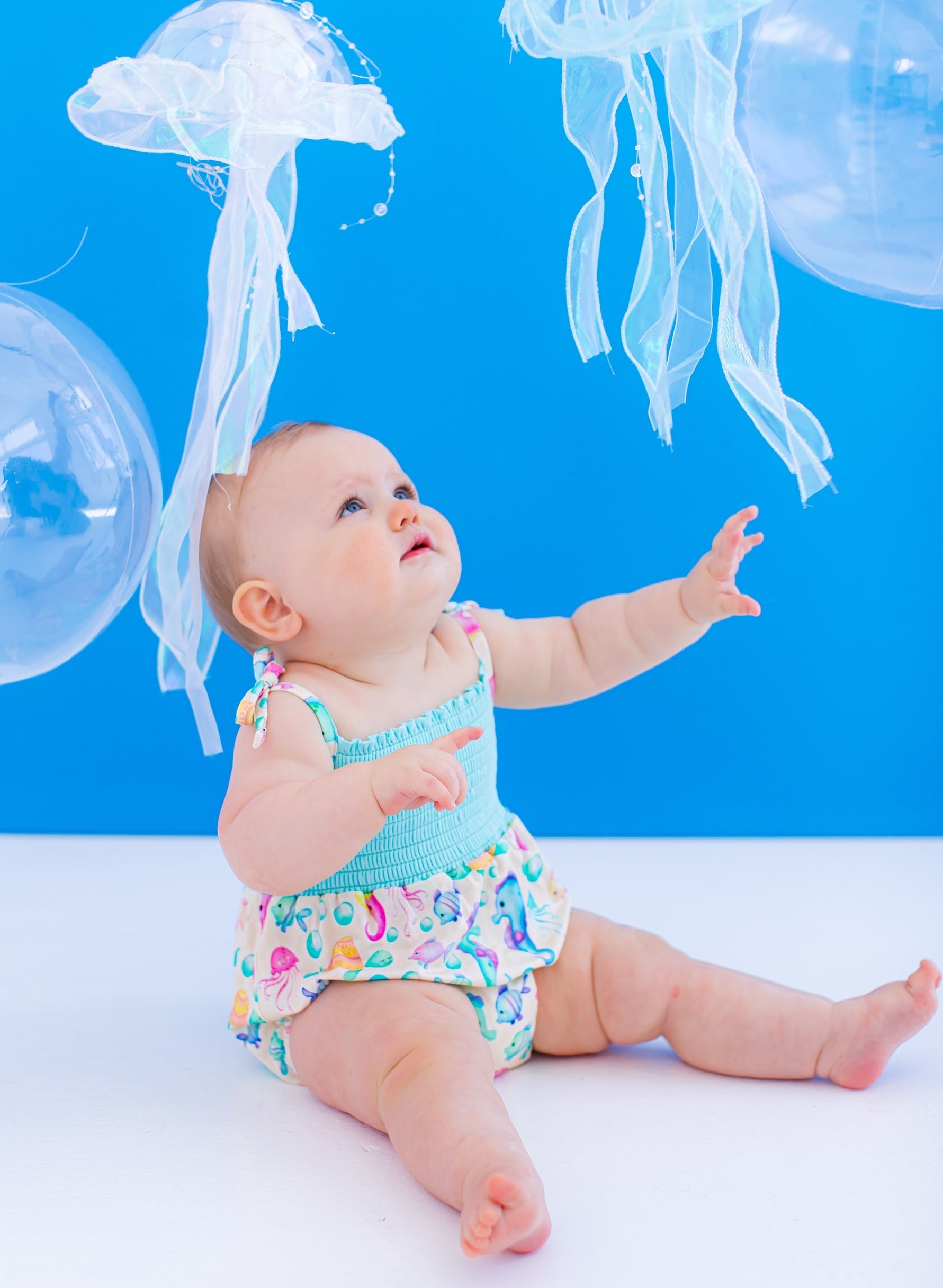 Coral Smocked Birdie Bubble