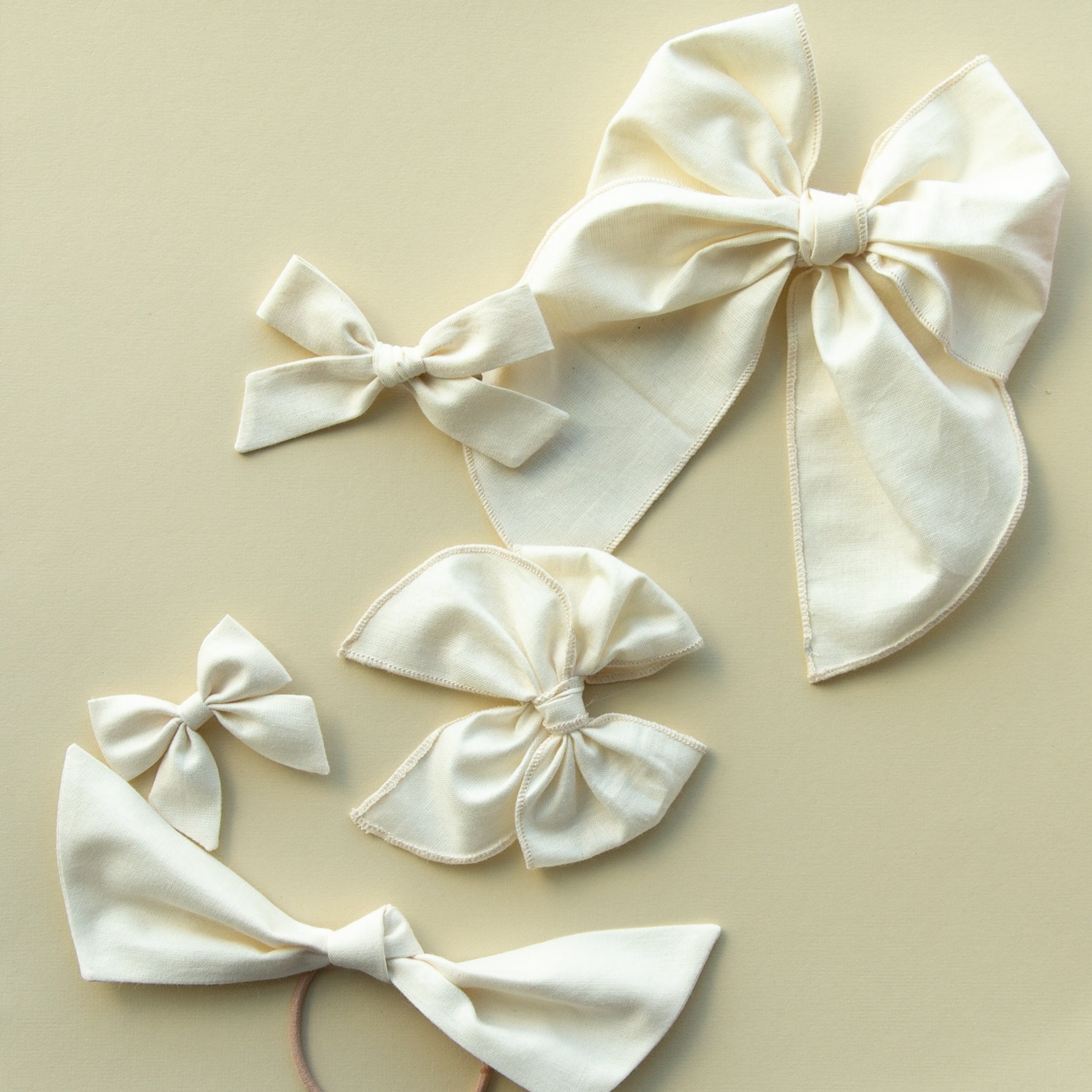 Whisper | Mini Piggy Bow