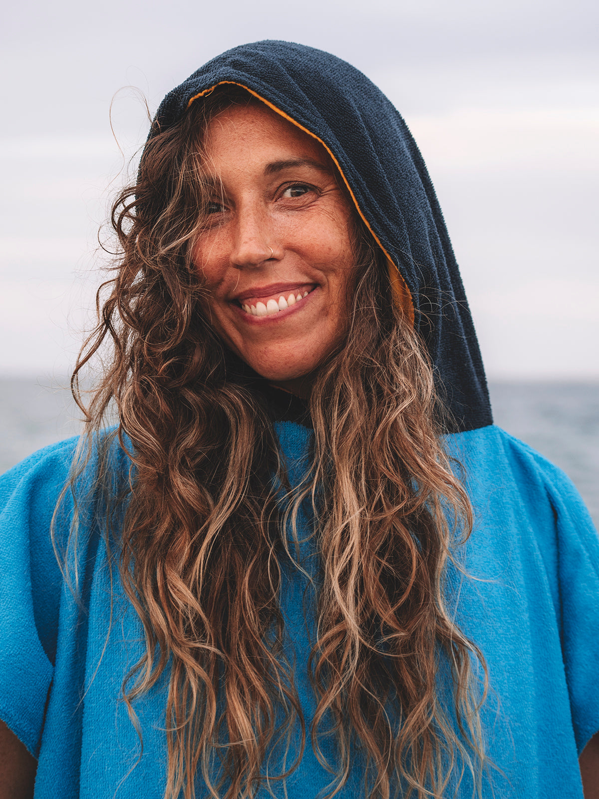 X Surreal Towel Poncho: Unisex