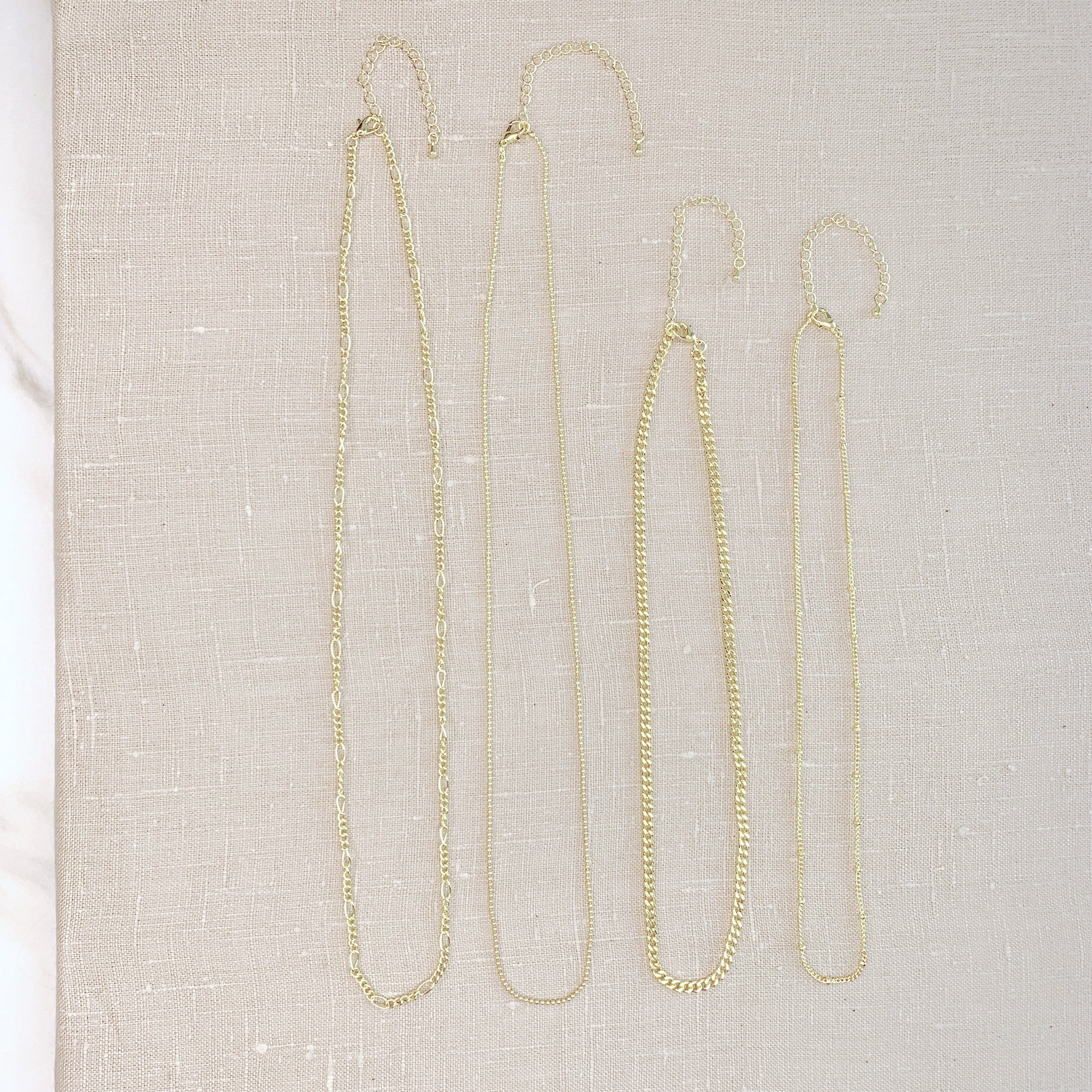 Gold Multi Chain Necklaces 4pc Set