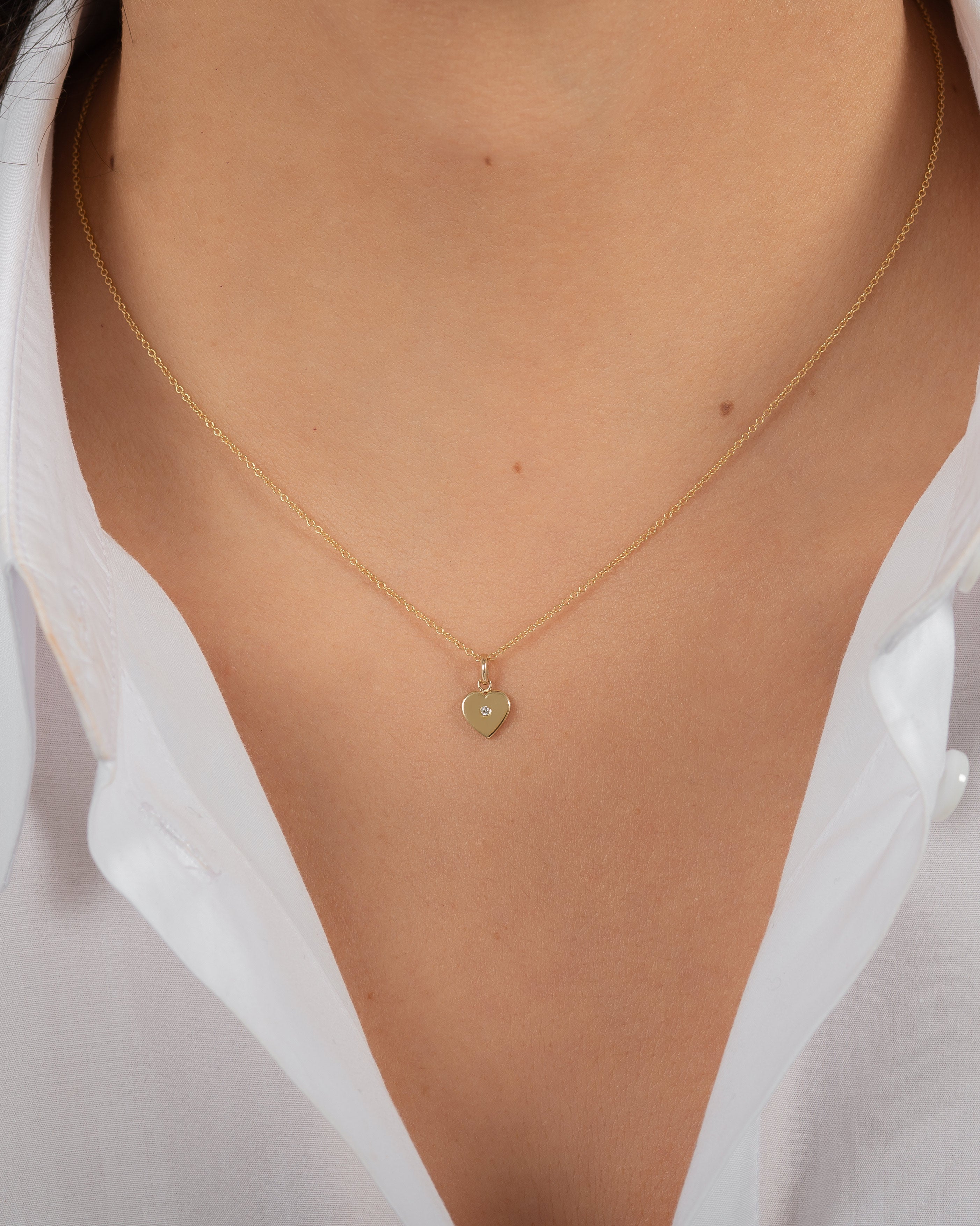 14k Gold Heart With Tiny Diamond Pendant