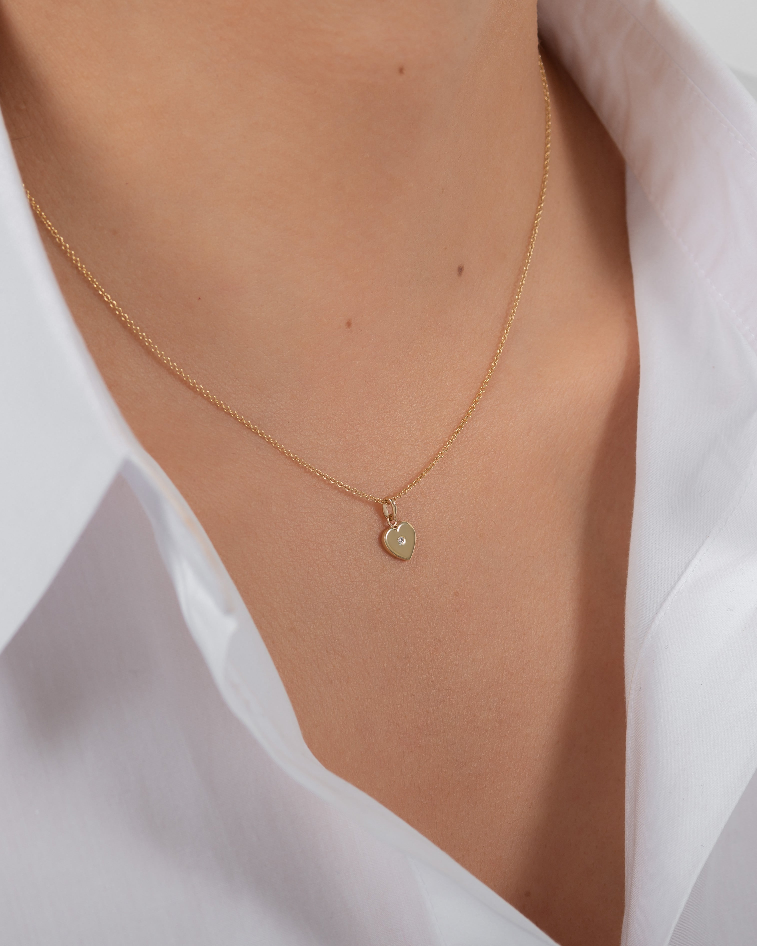 14k Gold Heart With Tiny Diamond Pendant