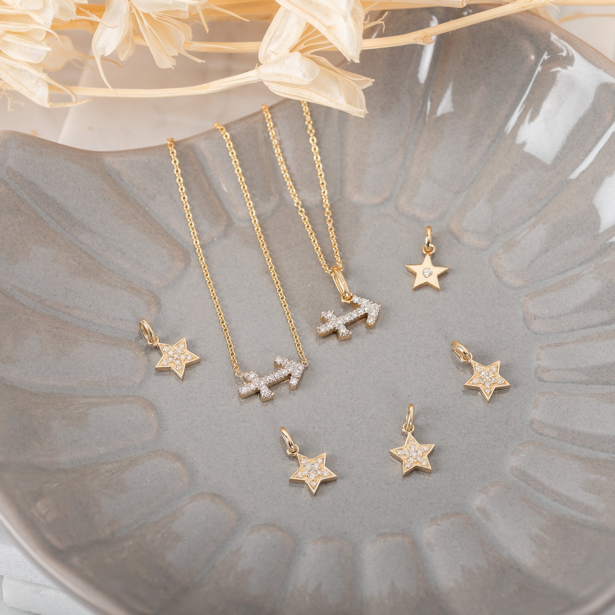 14k Gold Star With Tiny Diamond Pendant