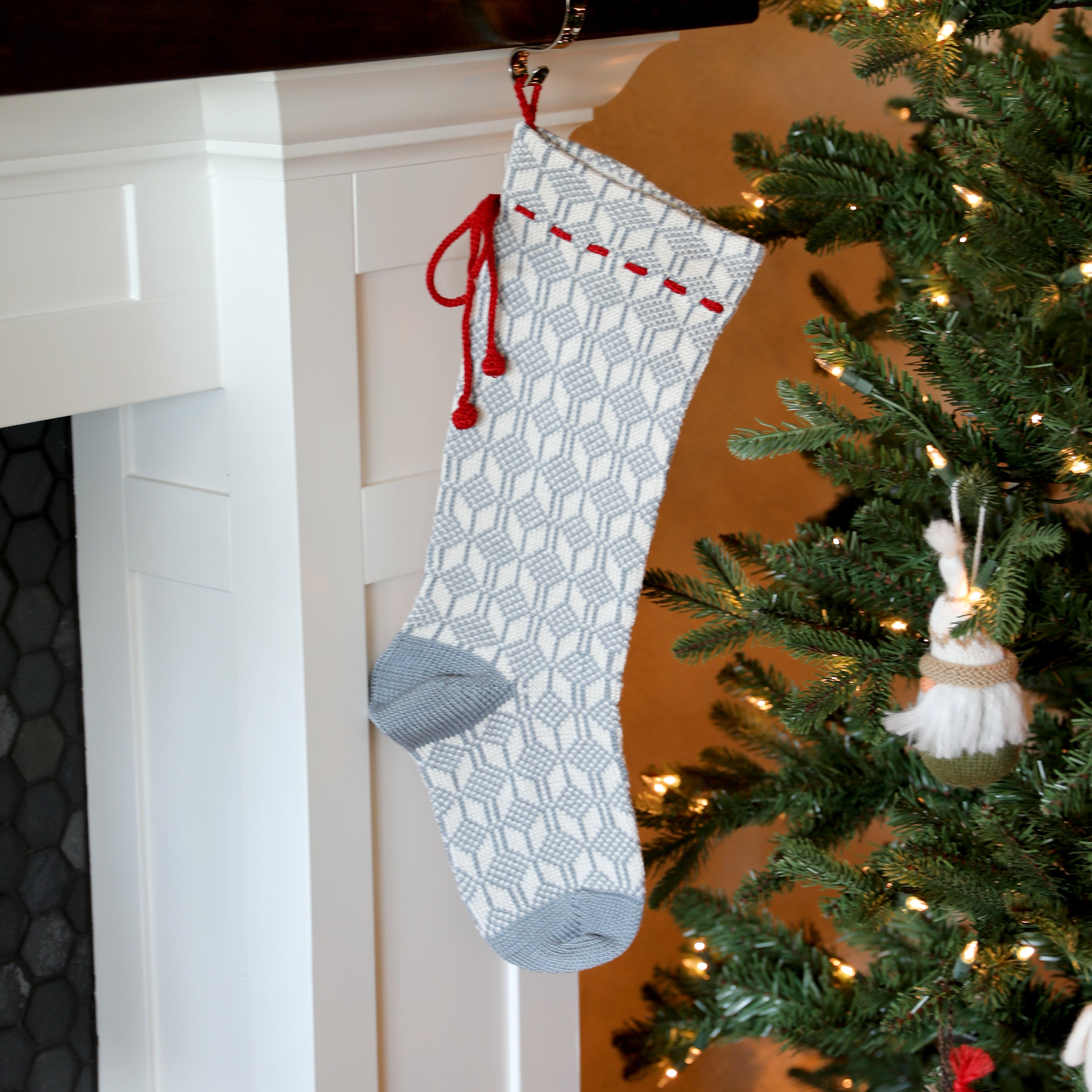 Grey Patterned Stocking With Red Bow