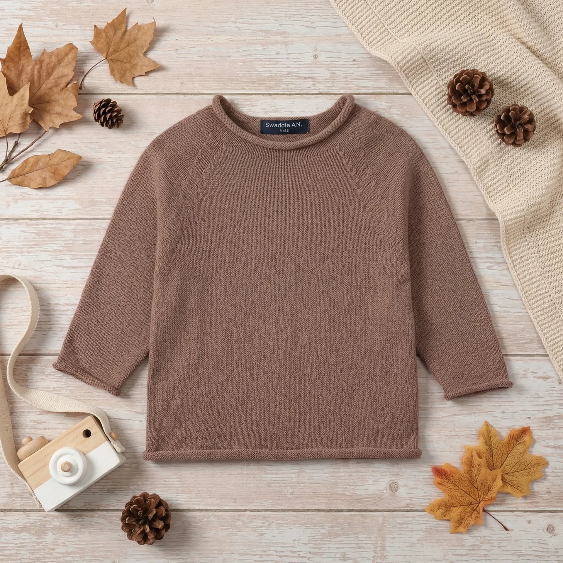 Knit Rollneck Baby Sweater In Mocha