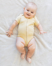 Short Sleeve Zipper Bodysuit In Latte, 9-12m