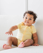 Short Sleeve Zipper Bodysuit In Lemon, 6-9m