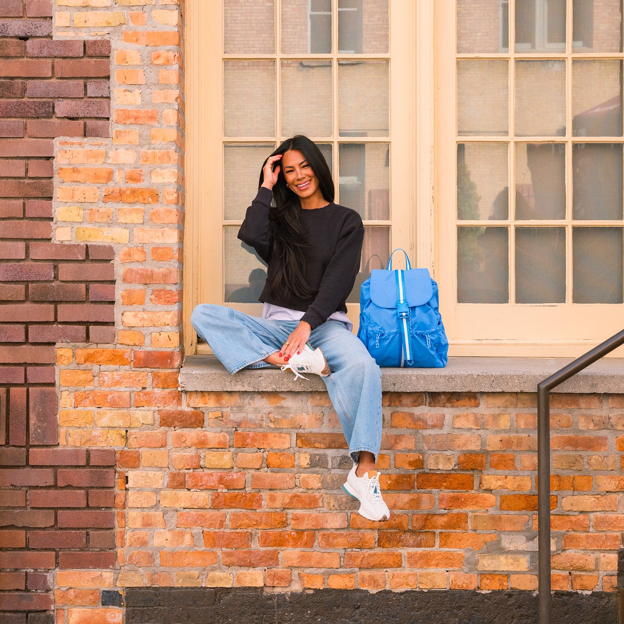 Wave Motion Drawcord Backpack