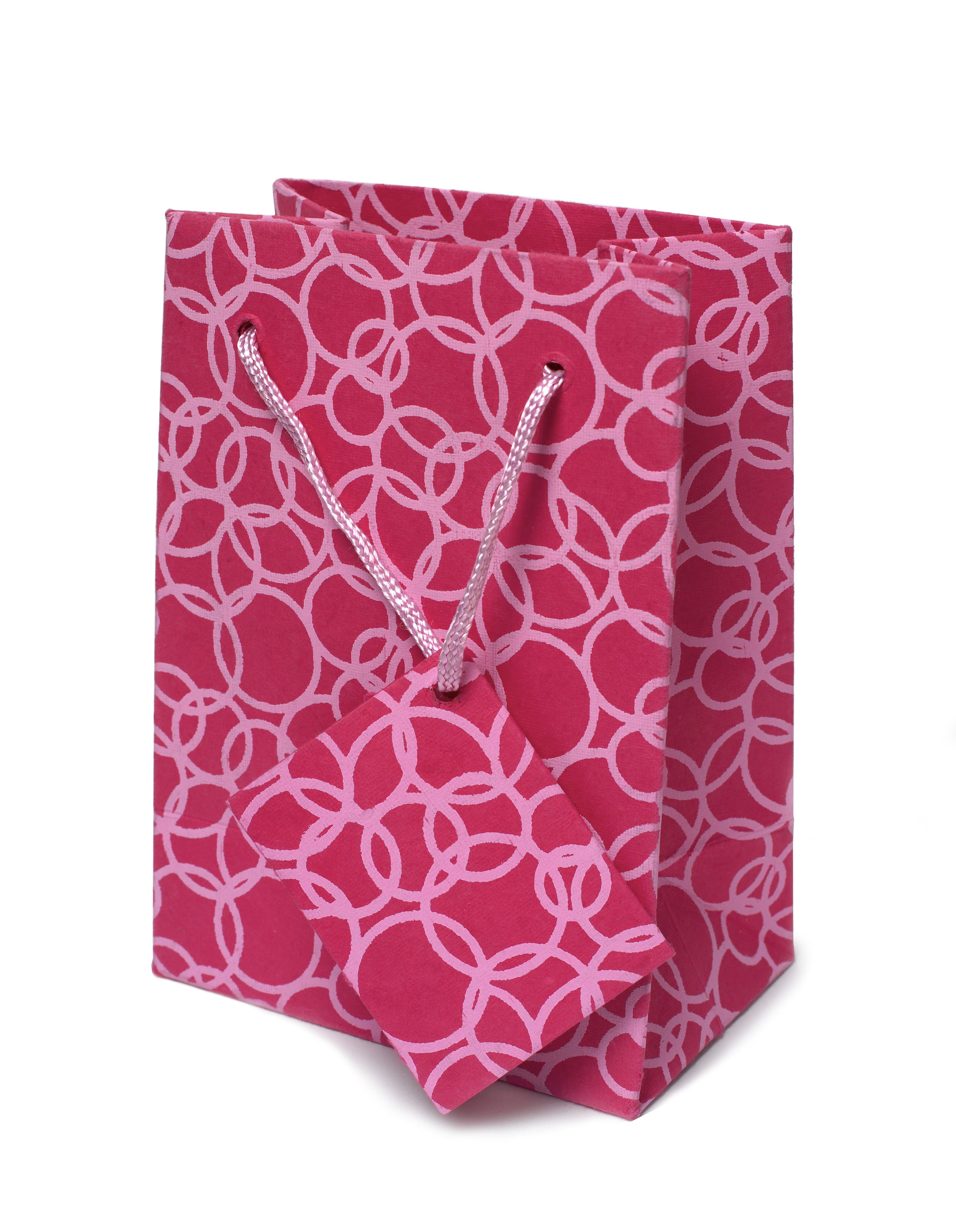 Set Of Six Recycled Cotton Gift Bags With Tag In Pink Circles Design