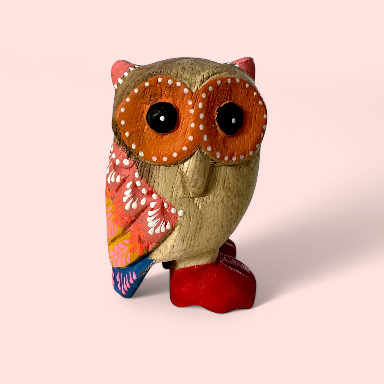 Pink-eared Owl With Red Boots