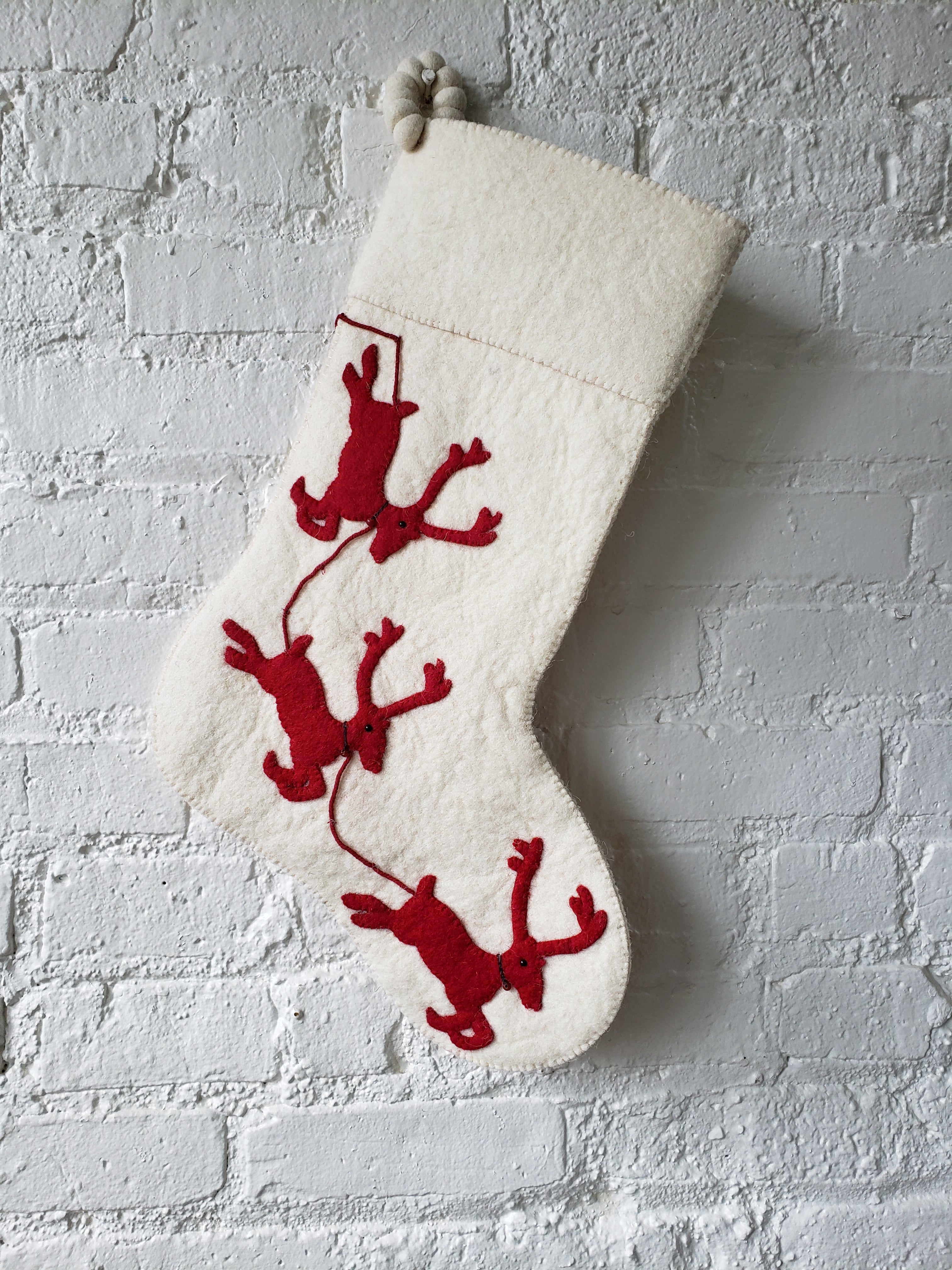 Cream Reindeer On Red Christmas Stocking