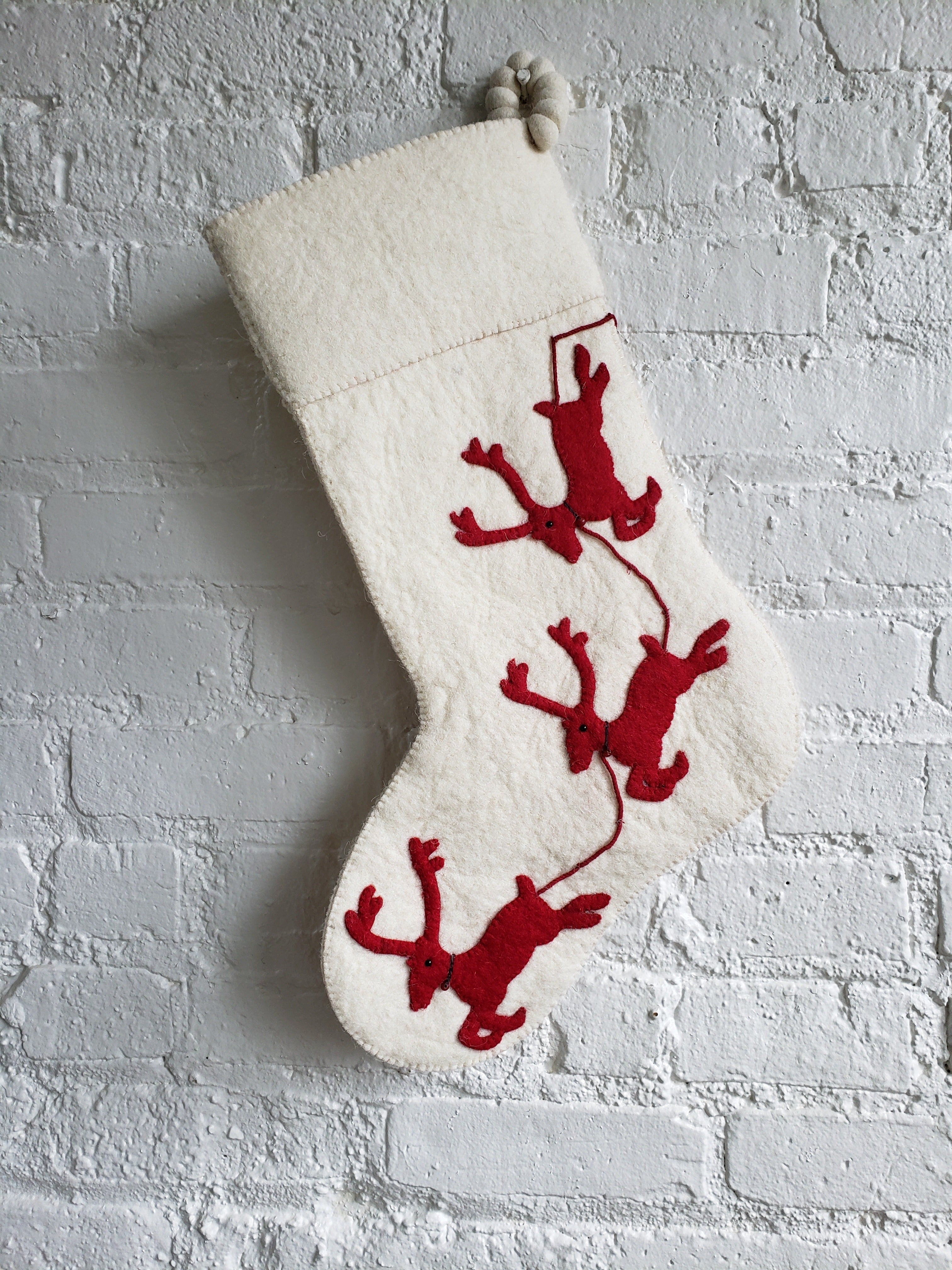 Cream Reindeer On Red Christmas Stocking