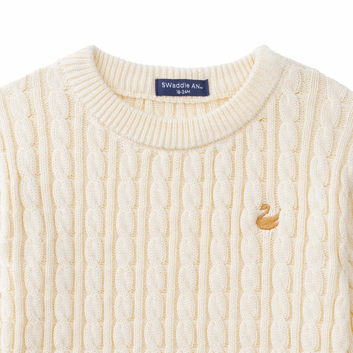 Classic Cable Knit Baby Sweater In Cream