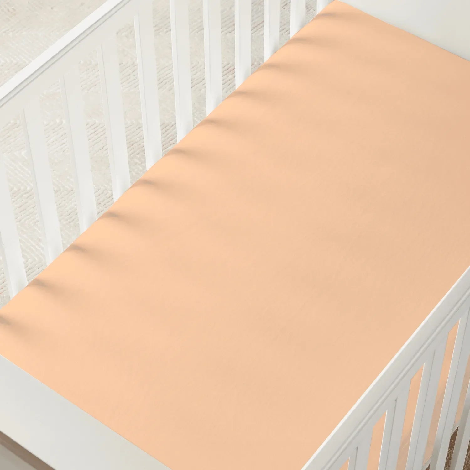 Bamboo Crib Sheet In Peach Fuzz