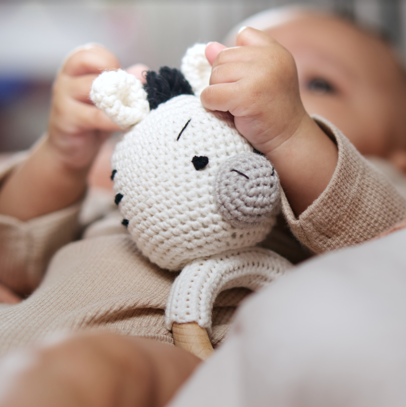 Handmade Organic Cotton Rattle Ring Teether · Zebra Design · Black And Grey With White Body Color