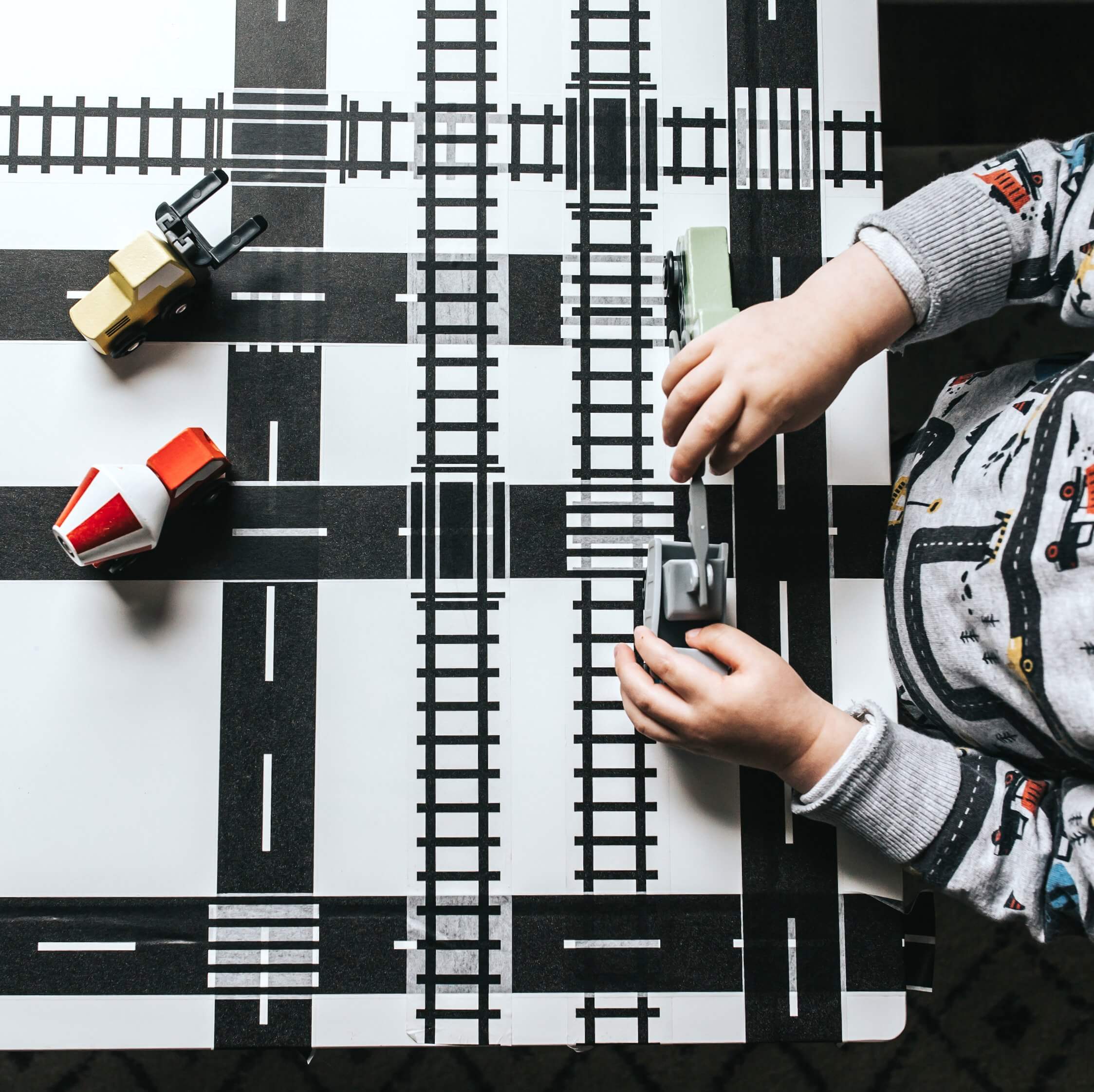 Roadway Tape 4-rolls: "he Can Play With His Cars Anywhere!"
