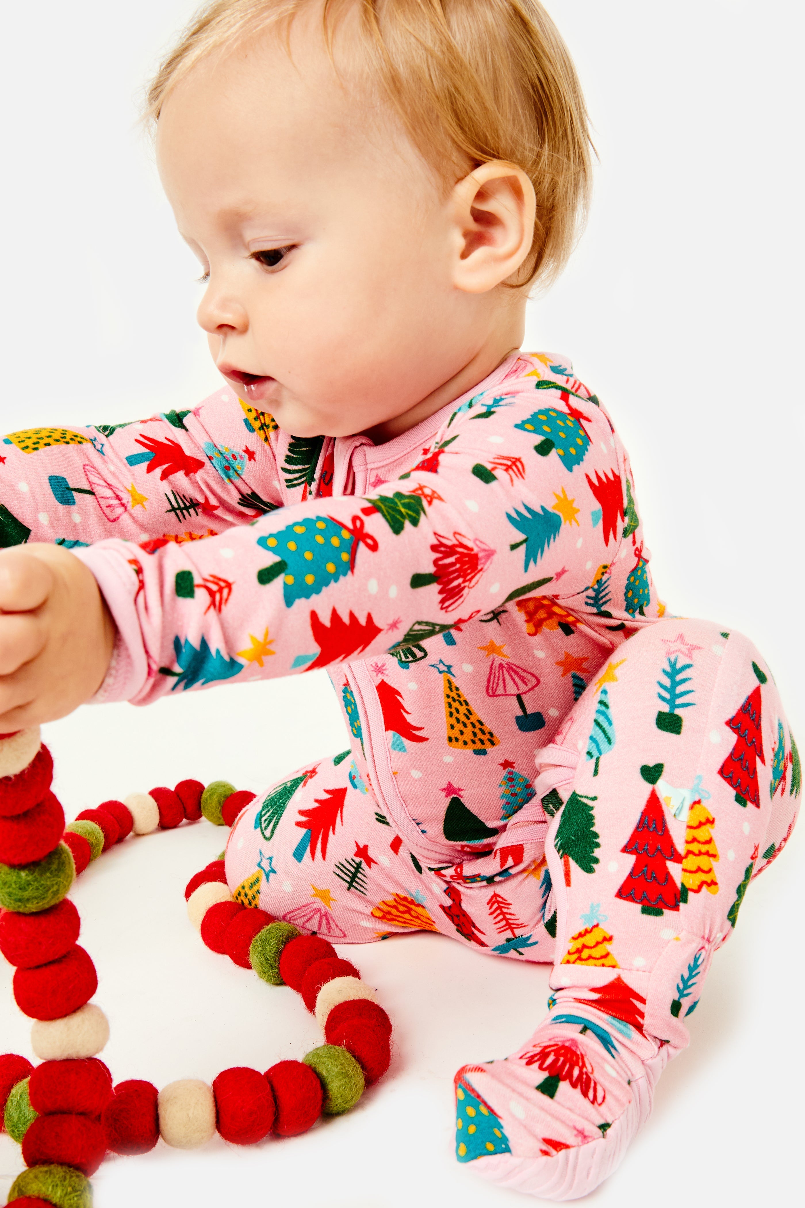 Soft & Stretchy Zipper Footie - Christmas Trees Pink