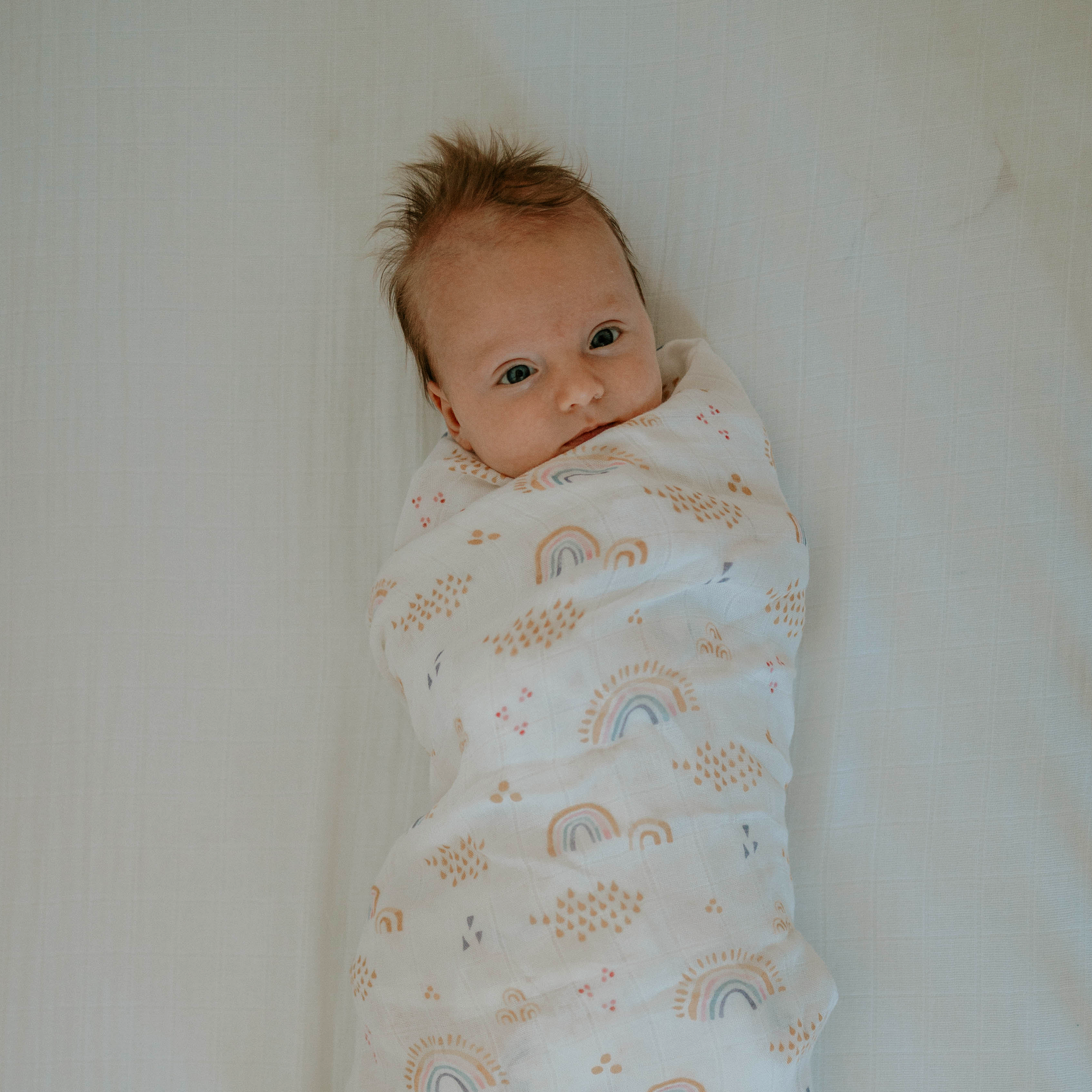 Deluxe Muslin Swaddle Blanket - Rainbows & Raindrops