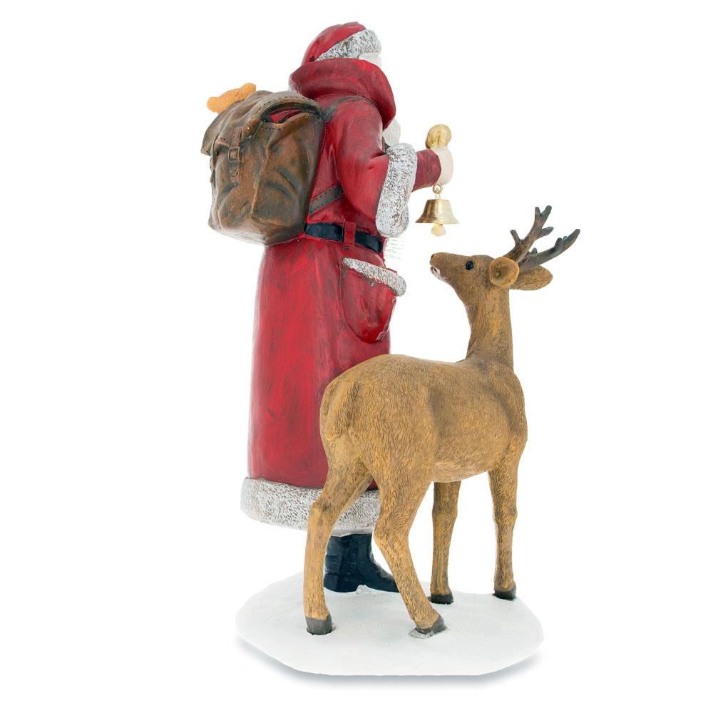 Santa Holding Christmas Tree And Bell By Reindeer Figurine 12 Inches