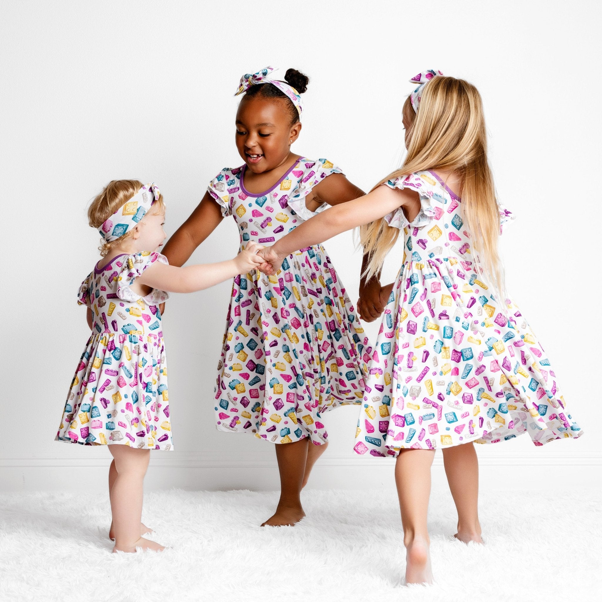 Block Party (purple) Short Sleeve Big Kid Twirl Dress