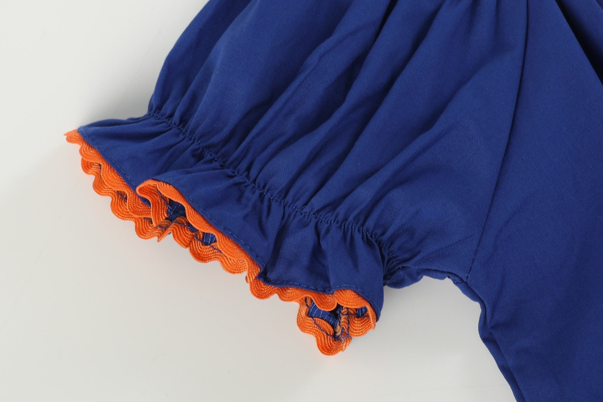 Blue And Orange Football Smocked Bishop Dress